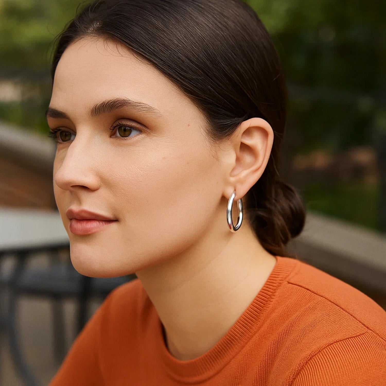 Sterling silver rhodium-plated polished hoop earrings with a sleek modern design, perfect for elegant occasions.