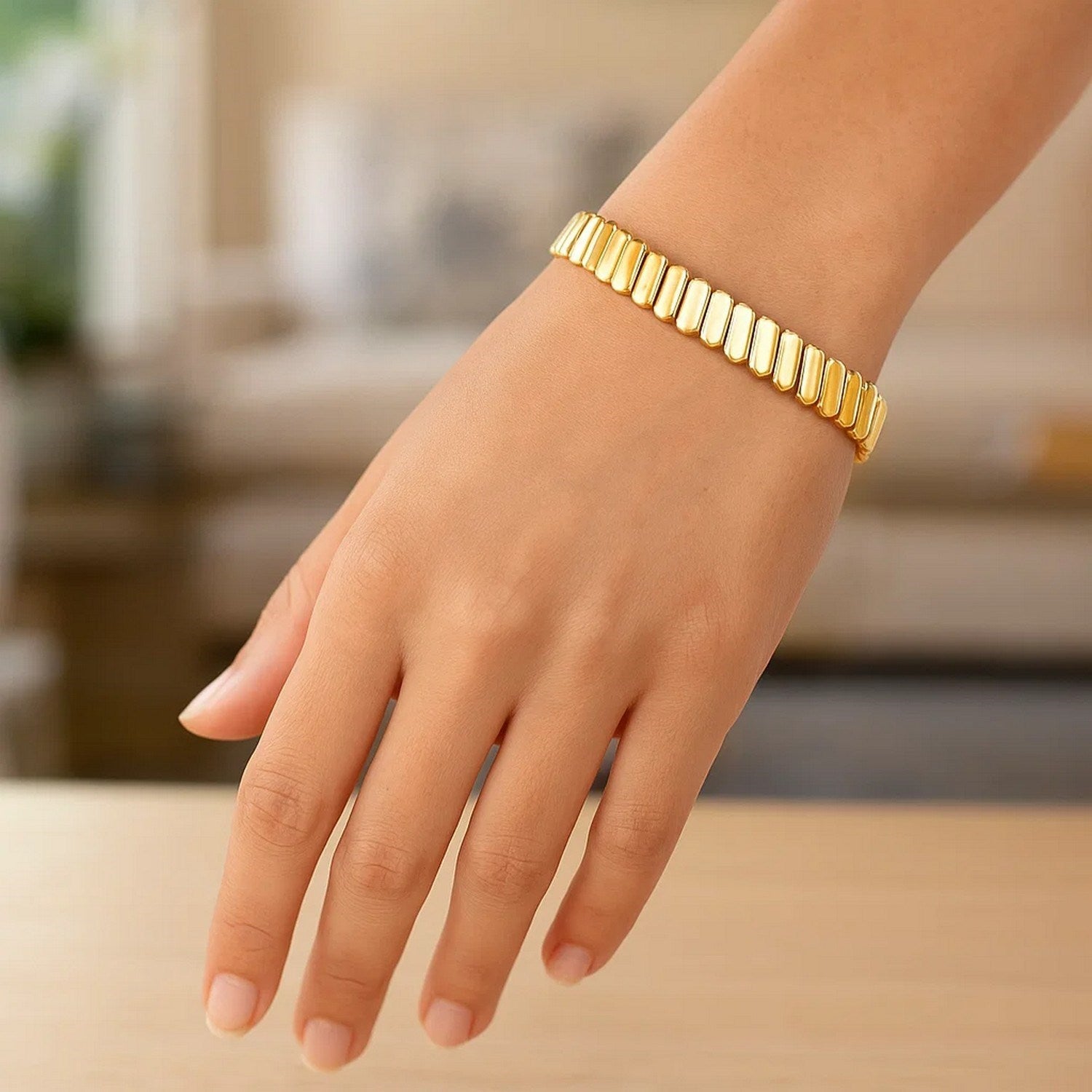 14k yellow gold rib link bracelet, 7.00 mm, showcasing a classic design with elegant, interlocking links.