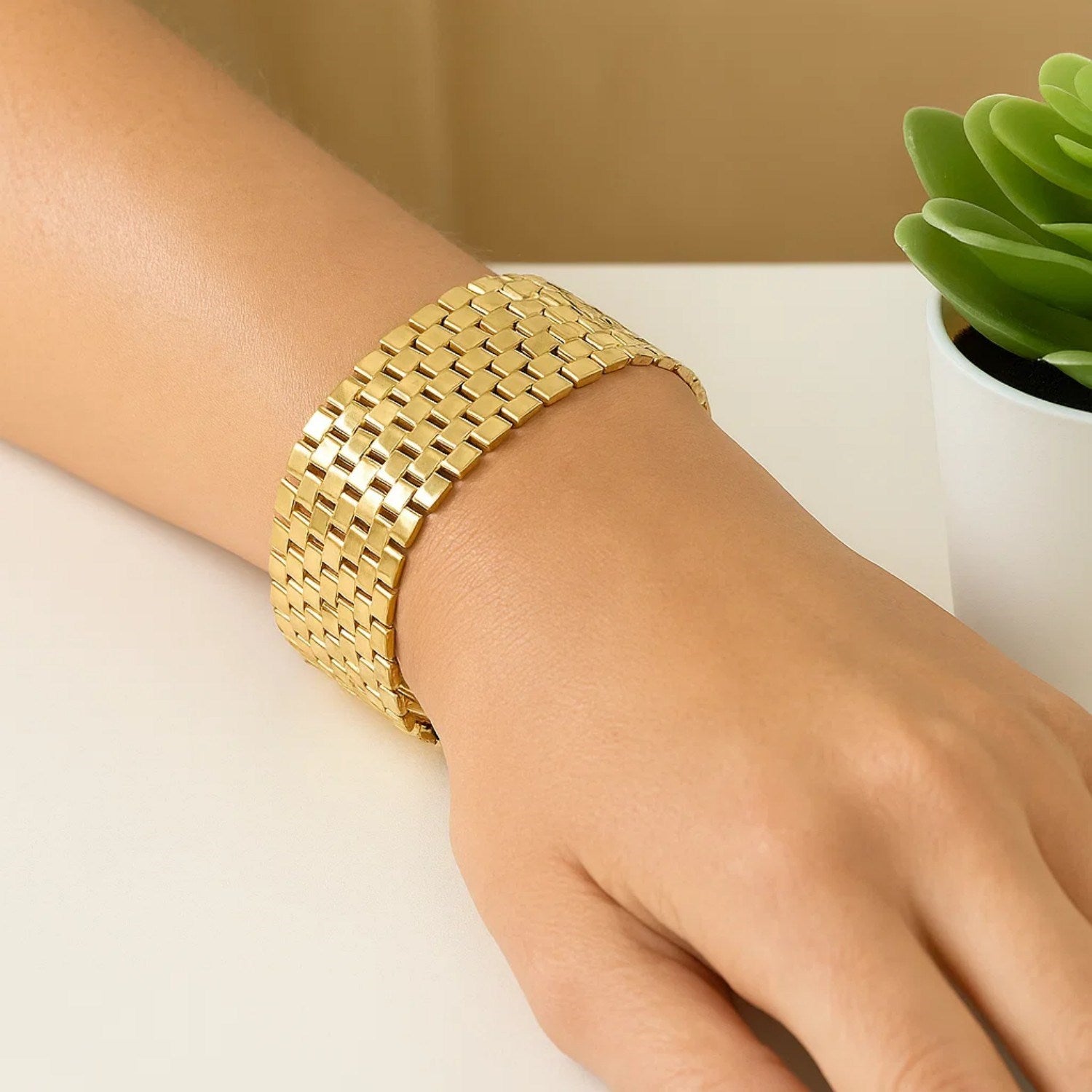 14k yellow gold large cobblestone link bracelet with modern design and luxurious shine, perfect for elegant occasions.