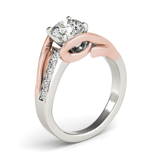 14k white and rose gold bypass shank engagement ring featuring a round diamond in a contemporary prong setting.