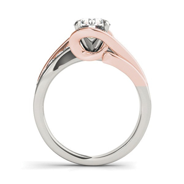 14k white and rose gold bypass shank engagement ring with round diamonds in a contemporary prong setting.