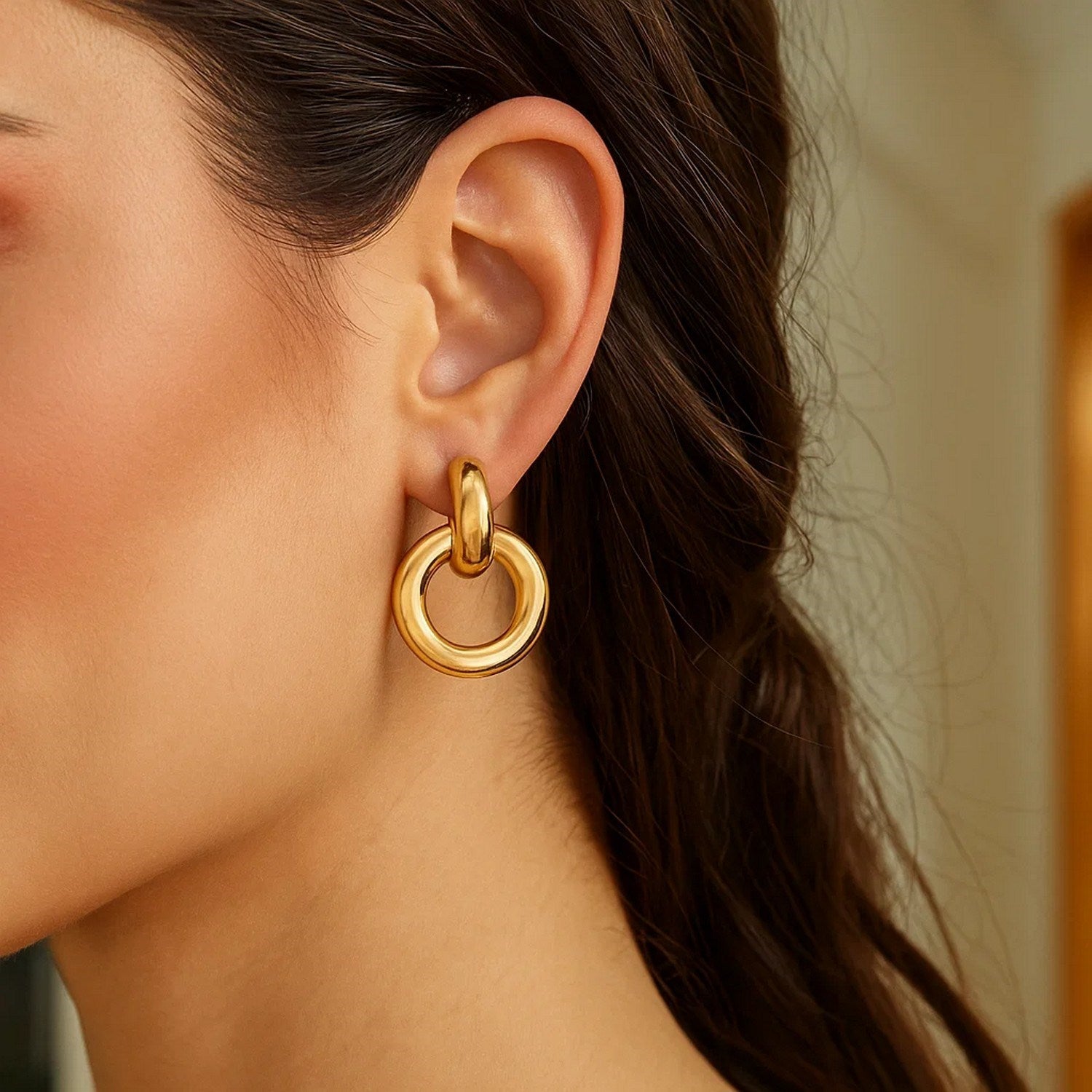 14K yellow gold polished round linked hoop earrings with modern design and elegant stud closure.