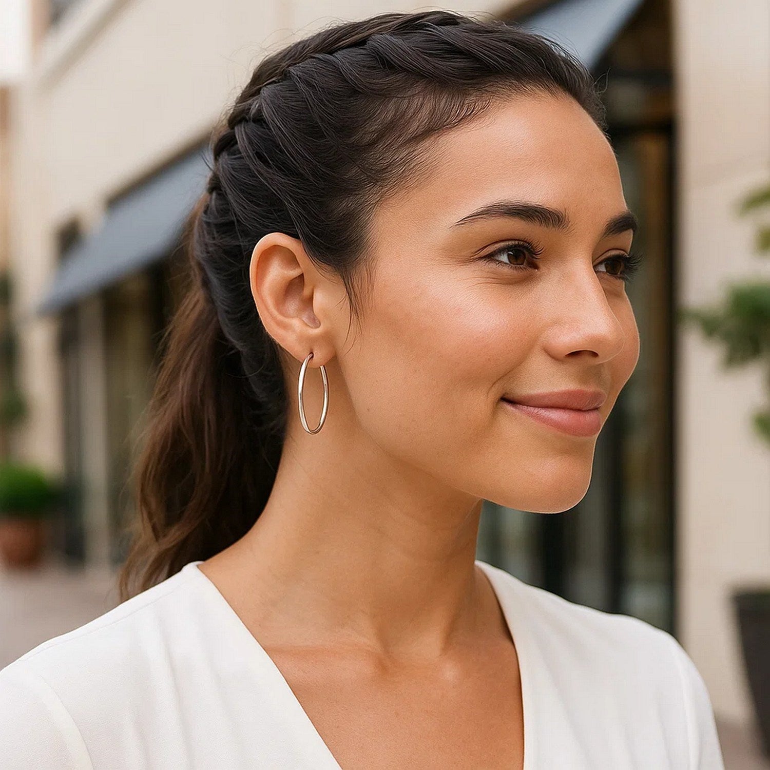 Sterling silver polished hoop earrings, classic design, showcasing elegance in a timeless 2x35mm size.