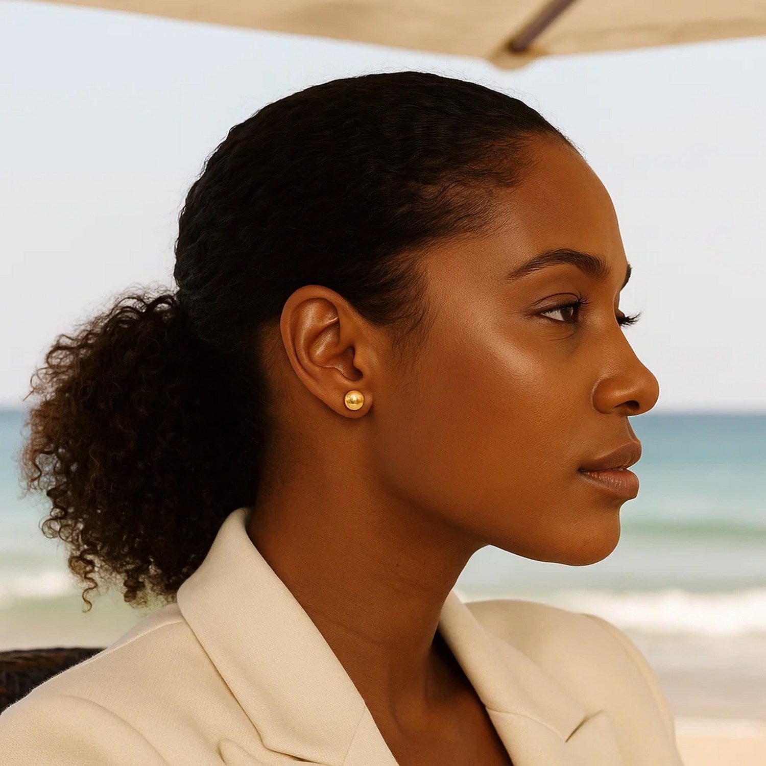 14k yellow gold polished stud earrings, minimalist design, 8mm size, perfect for elegant everyday wear.