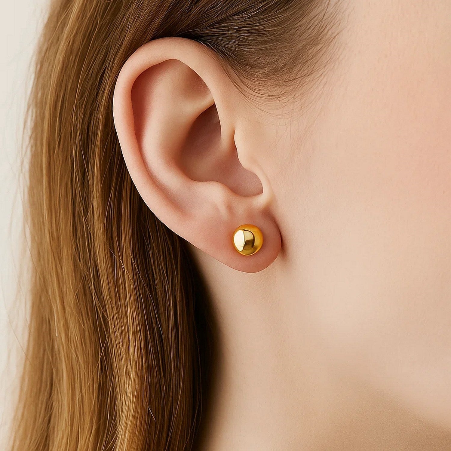 14k yellow gold polished stud earrings, minimalist design, 8mm size, perfect for elegant everyday wear.