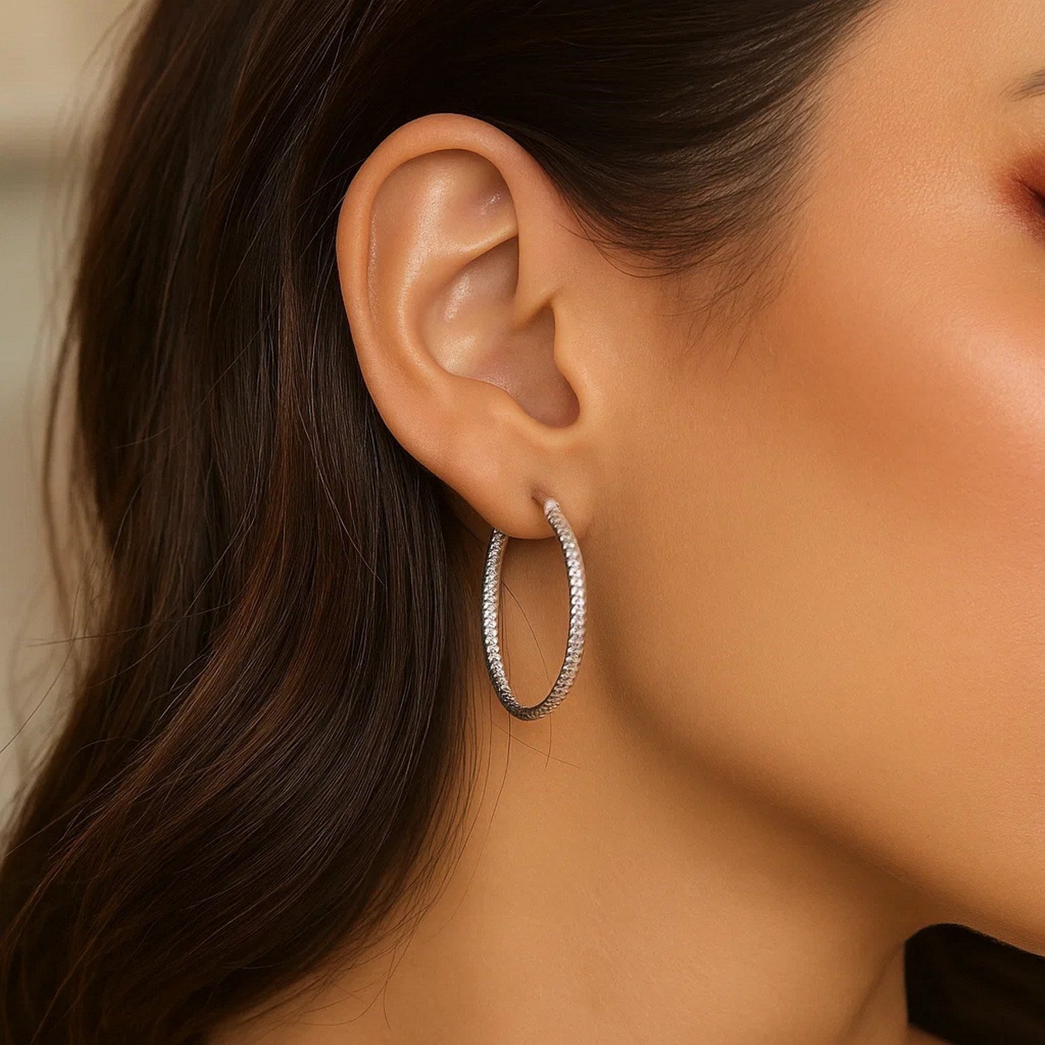 Sterling silver rhodium plated polished hoop earrings with a sleek modern design, perfect for elegant occasions.