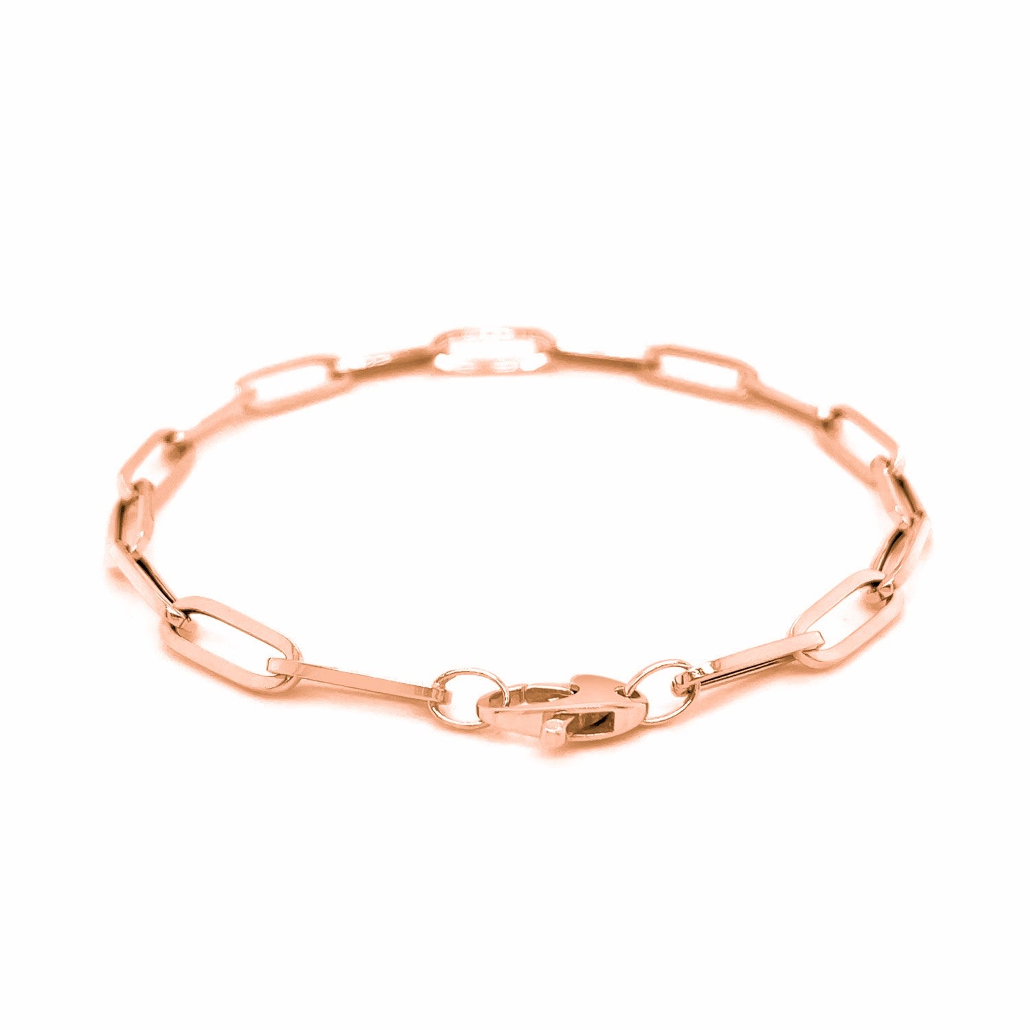 14k rose gold bold paperclip chain bracelet with modern links, showcasing luxurious elegance and refined craftsmanship.
