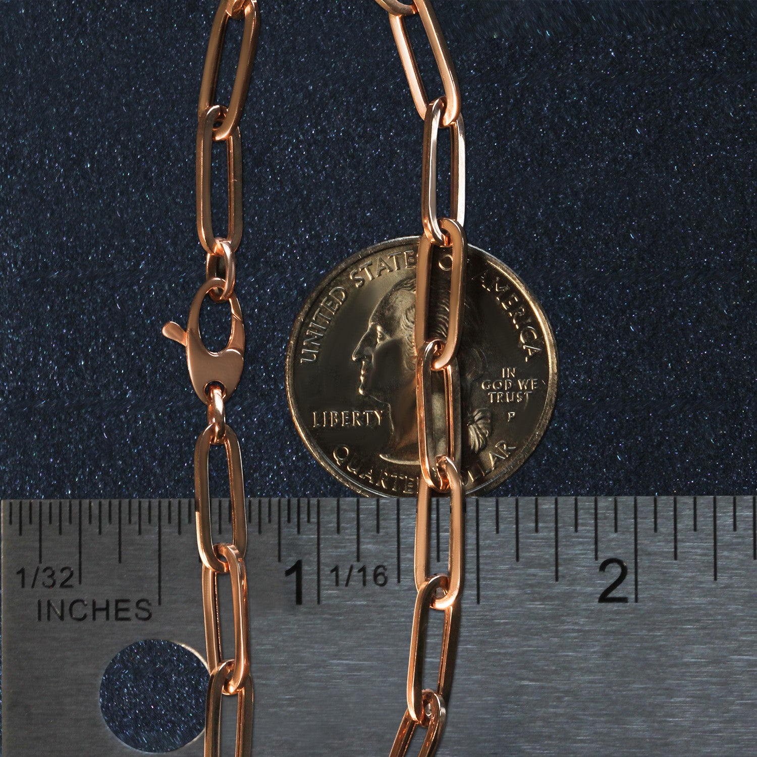 14k rose gold bold paperclip chain bracelet featuring modern links, perfect for elegant layering or standalone wear.