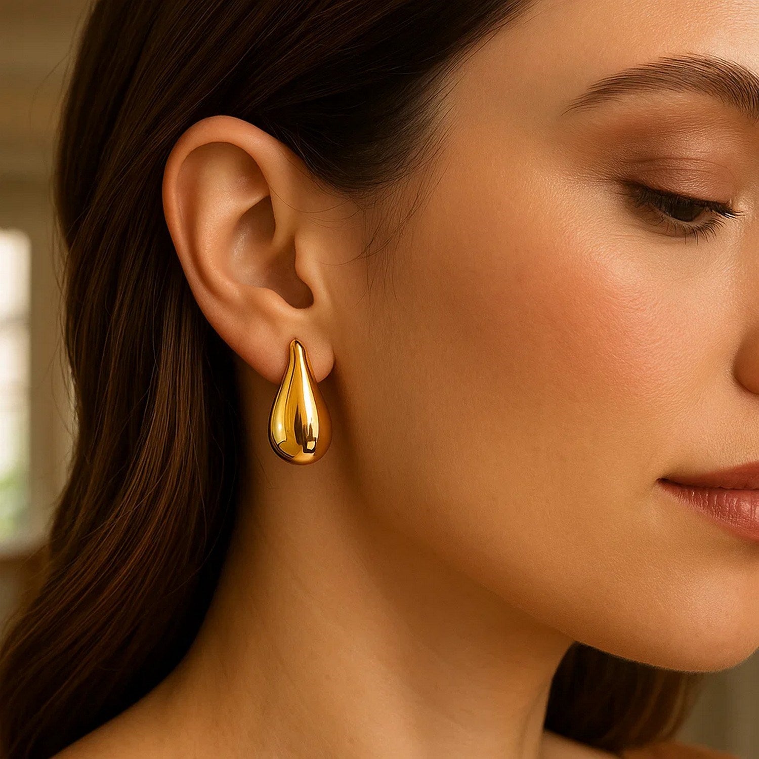 14k yellow gold polished stud drop earrings with a modern design, perfect for elegant occasions and everyday wear.