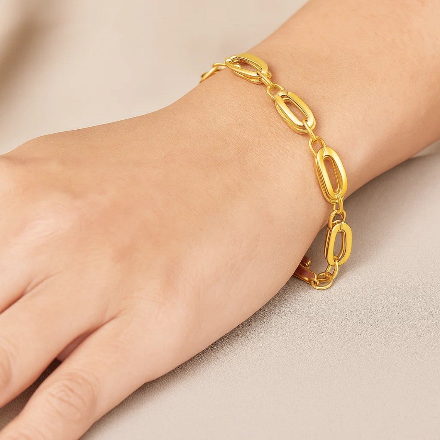 14k yellow gold bracelet featuring elegant long double oval links in a classic design, perfect for luxury styling.