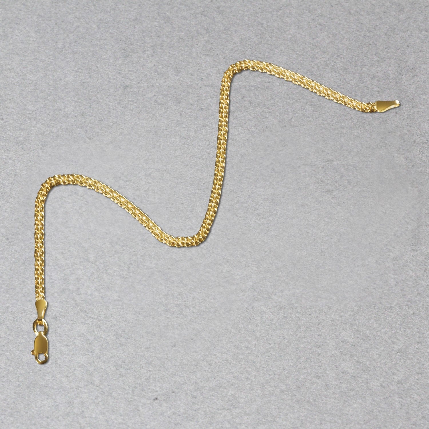 Elegant 14k yellow gold Bismark bracelet featuring a refined chain design, perfect for sophisticated styling.