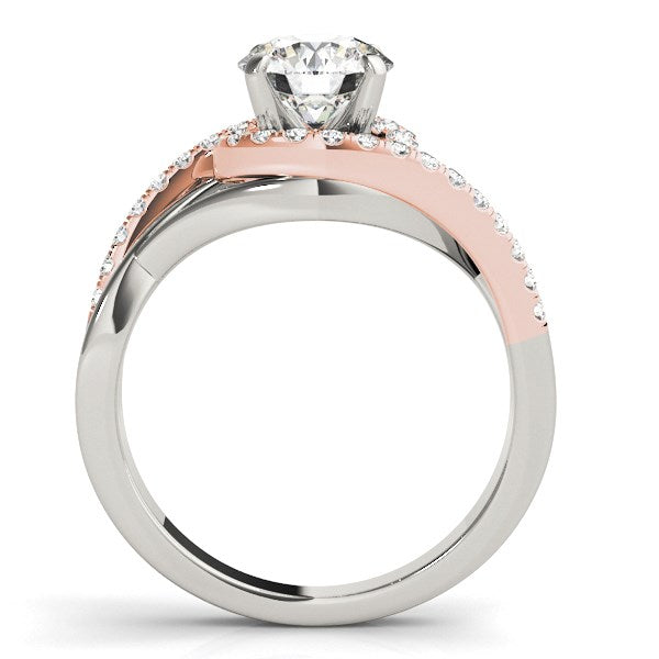 14k white and rose gold bypass engagement ring featuring a halo of diamonds in a modern prong setting.