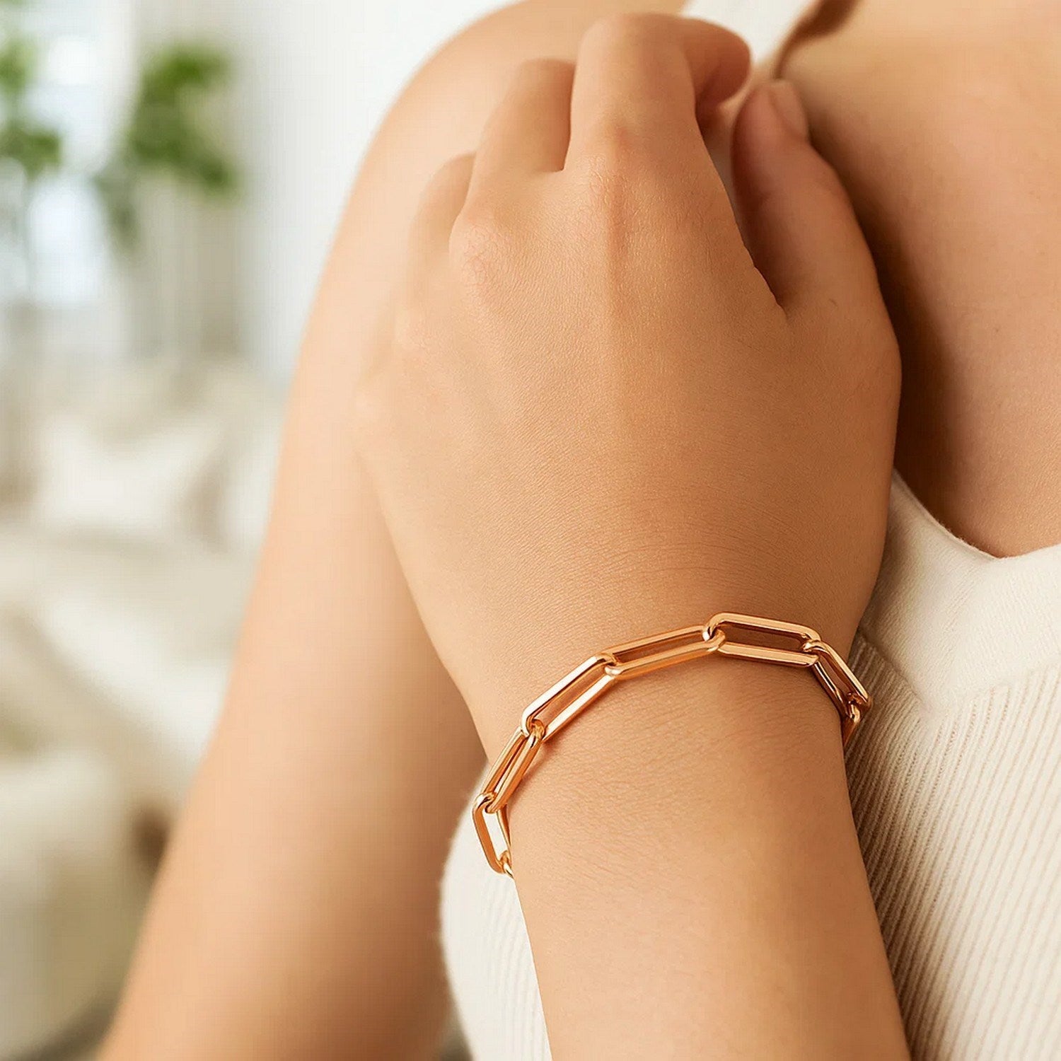 14k rose gold extra wide paperclip chain bracelet, modern design with elegant round links for a luxurious touch.