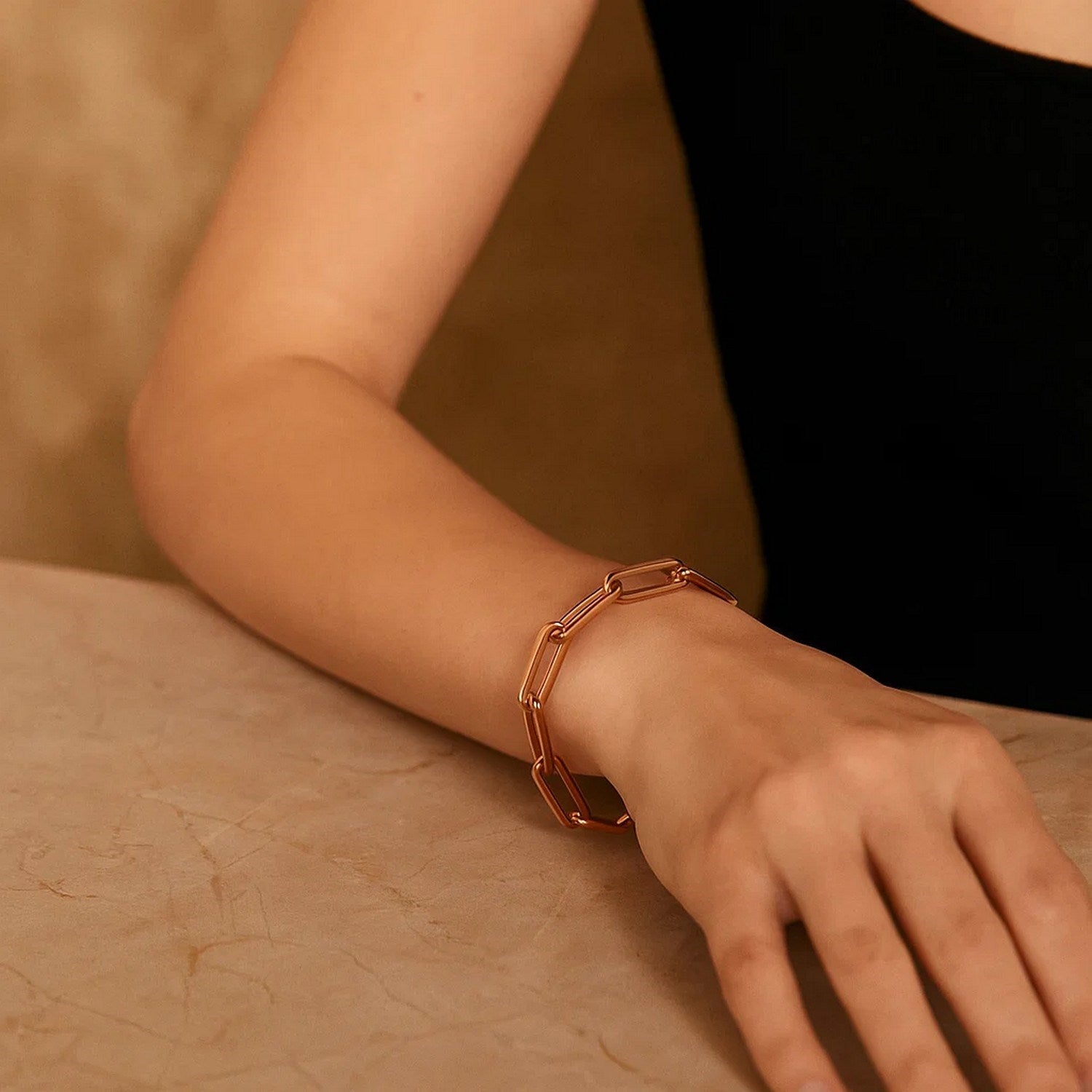 14K rose gold extra wide paperclip chain bracelet, modern design with elegant round links, perfect for luxury styling.