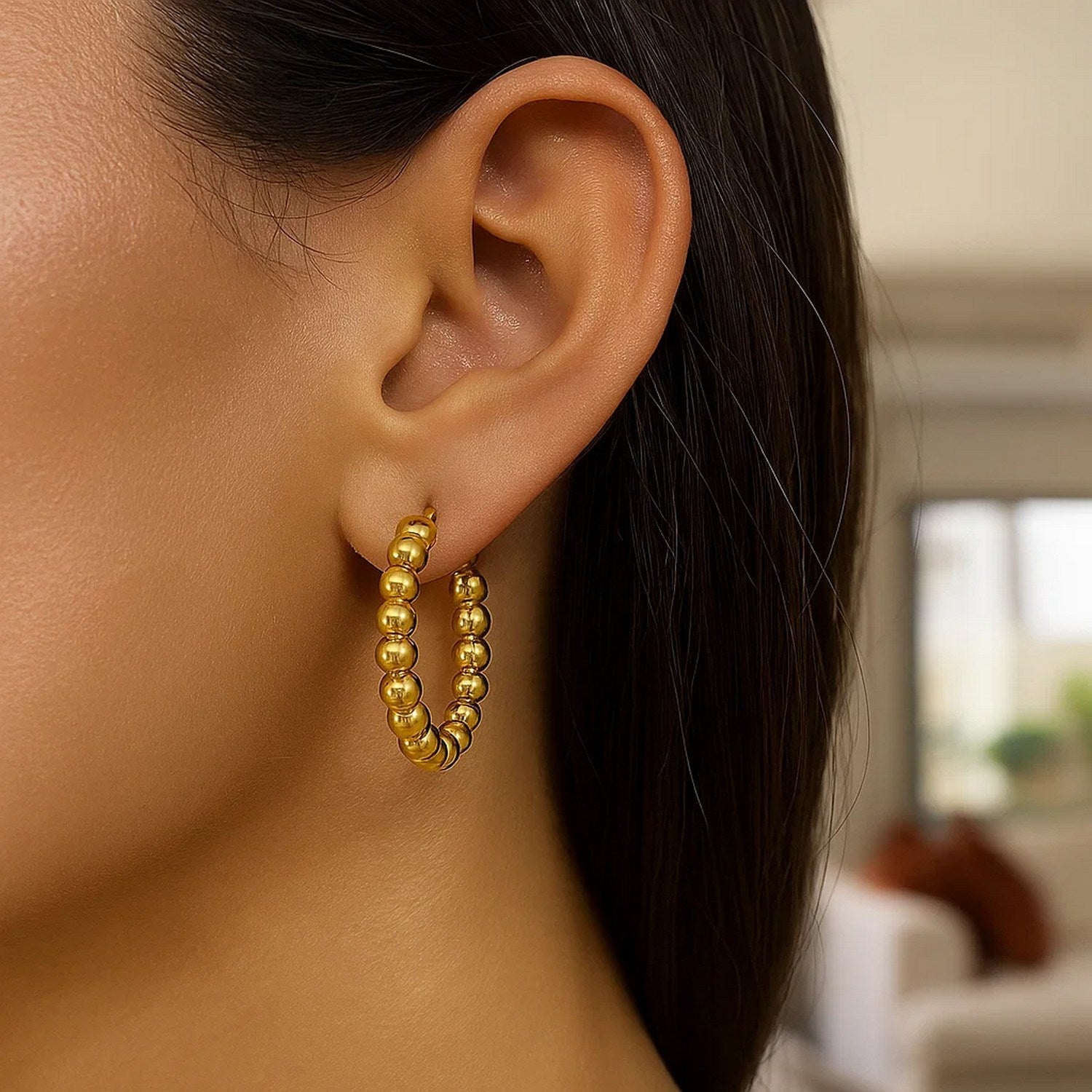 14k yellow gold textured polished hoop earrings with a modern design, perfect for elegant occasions.