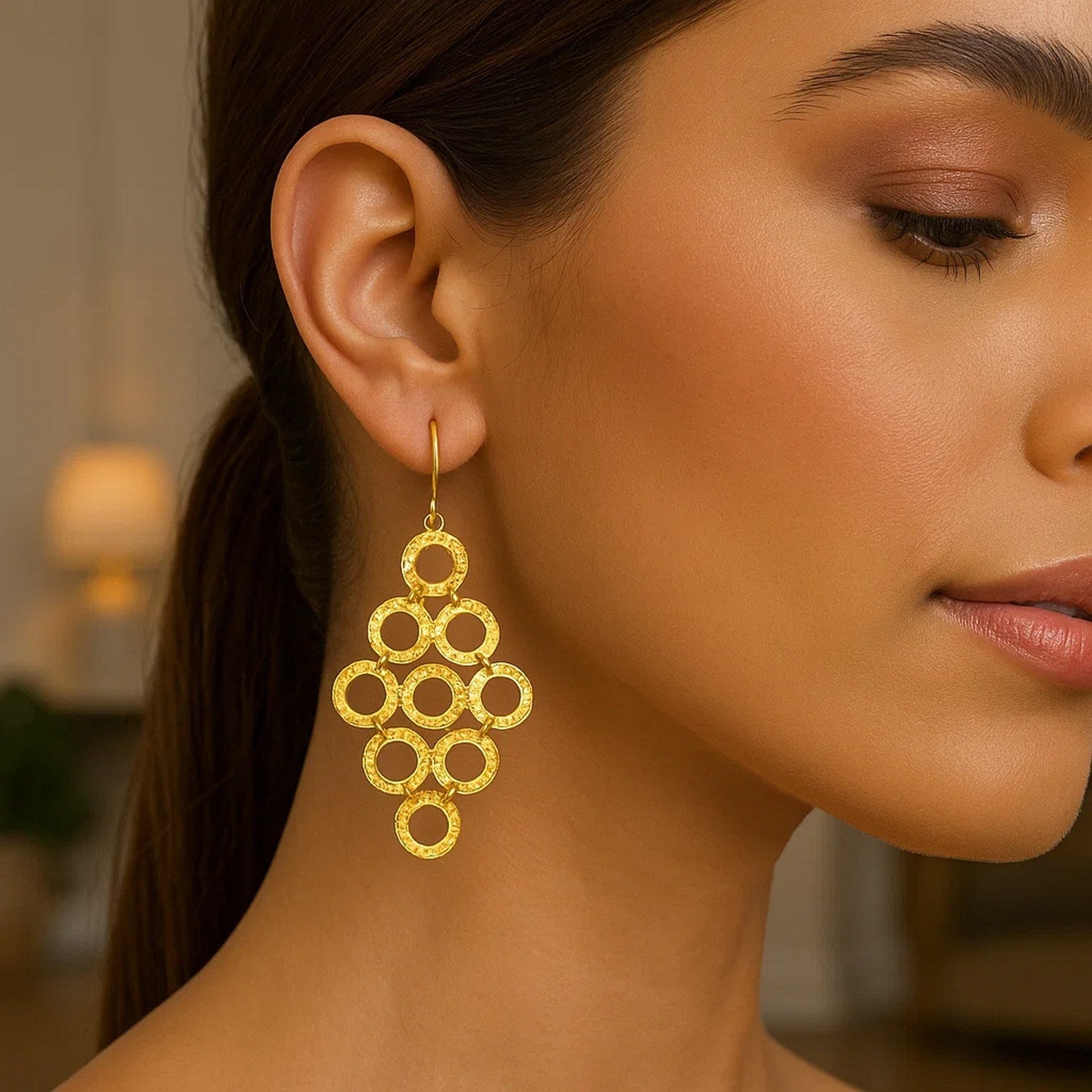 Elegant 14k yellow gold textured open circle earrings showcasing a luxurious design for refined style.