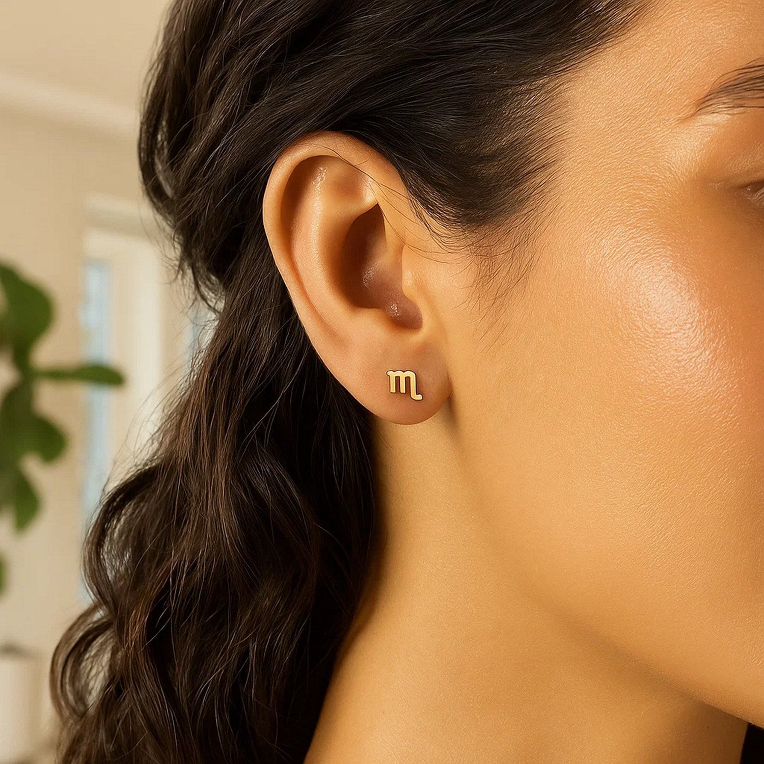 Contemporary 14k yellow gold Scorpio stud earrings featuring a sleek, minimalist design for elegant allure.