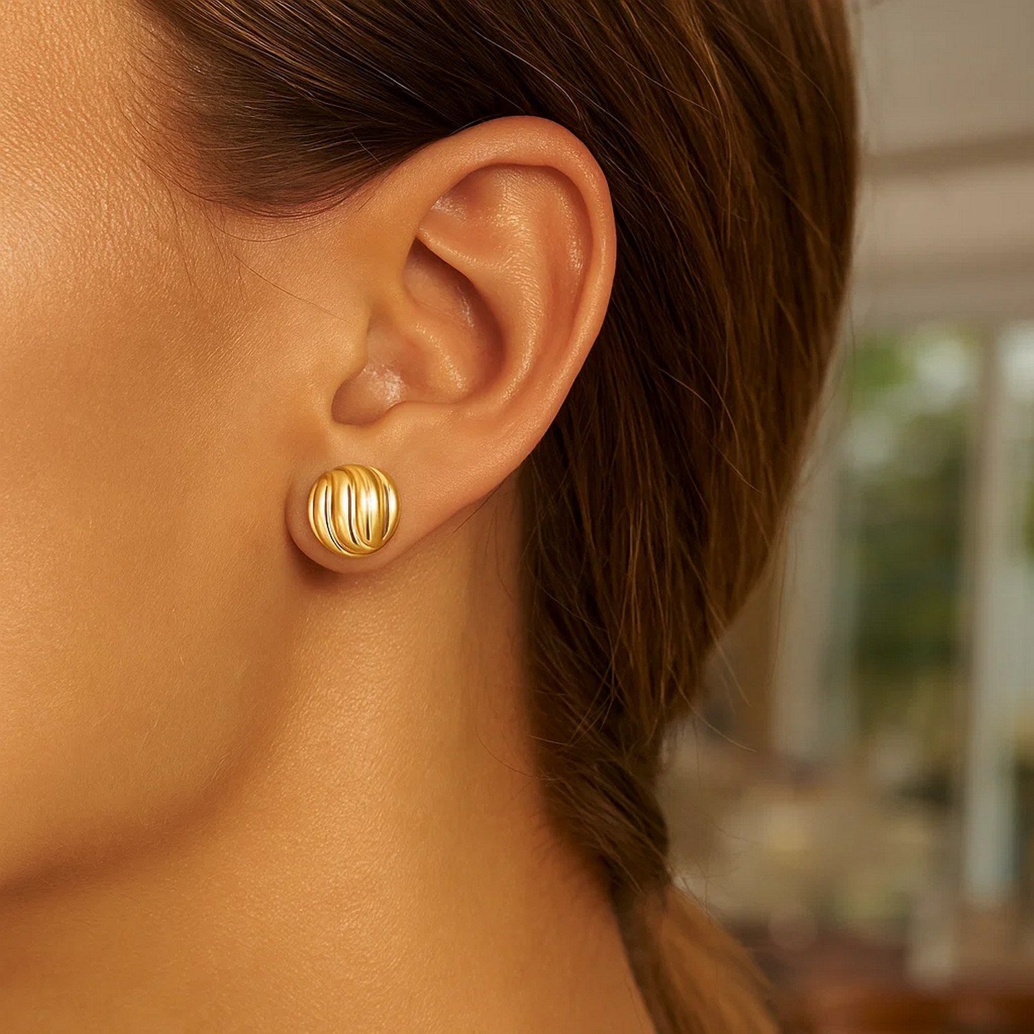 14k yellow gold modern swirl button stud earrings with elegant design, perfect for sophisticated style.