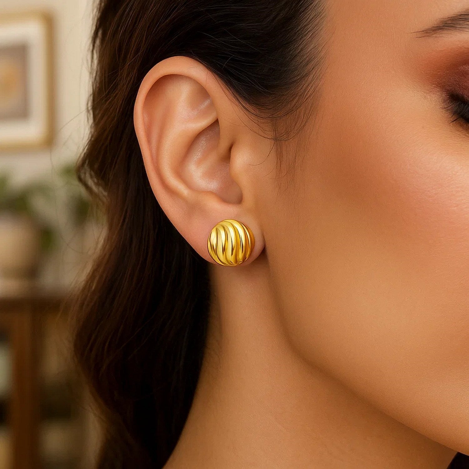 14k yellow gold modern swirl button stud earrings showcasing a sleek, elegant design for a luxurious touch.