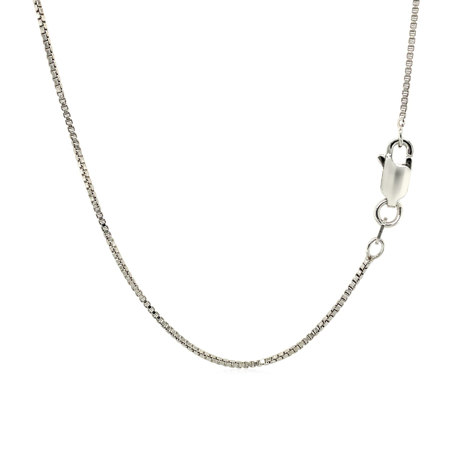 Sterling silver pendant featuring a ridge textured love knot design, elegantly suspended on a classic chain.