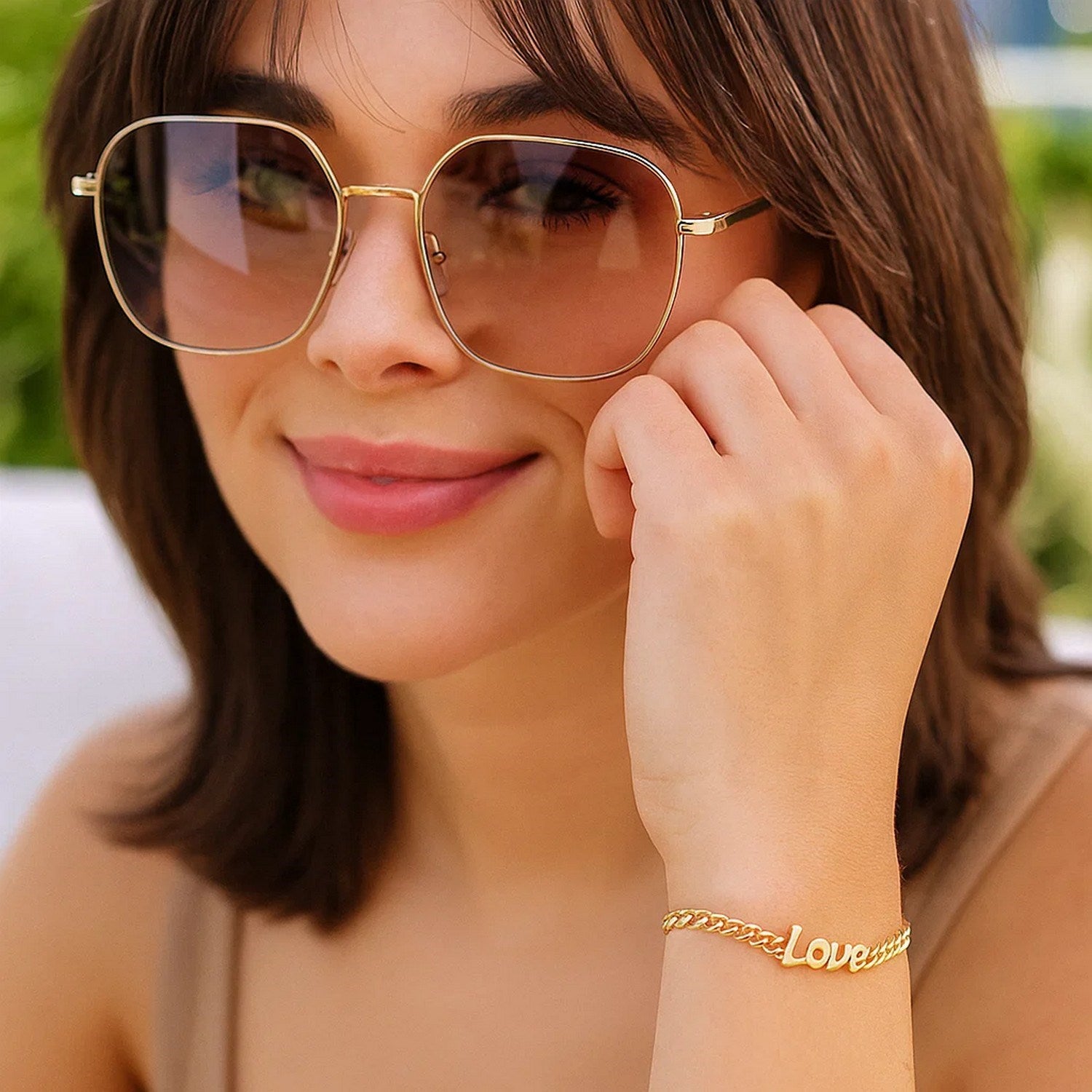 14k yellow gold 7-inch curb chain love bracelet showcasing a classic link design for timeless elegance.