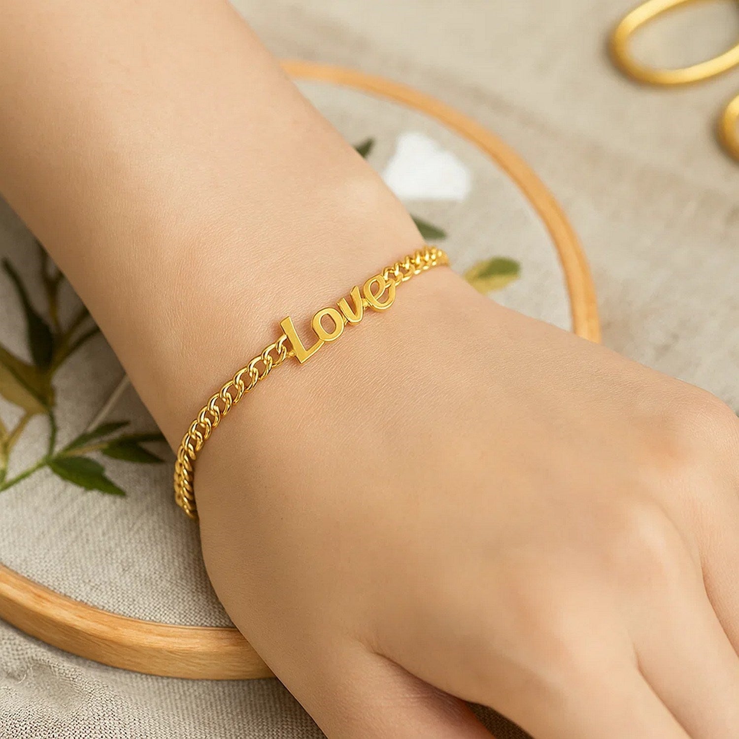 14k yellow gold 7-inch curb chain love bracelet with classic links, perfect for elegant everyday wear.