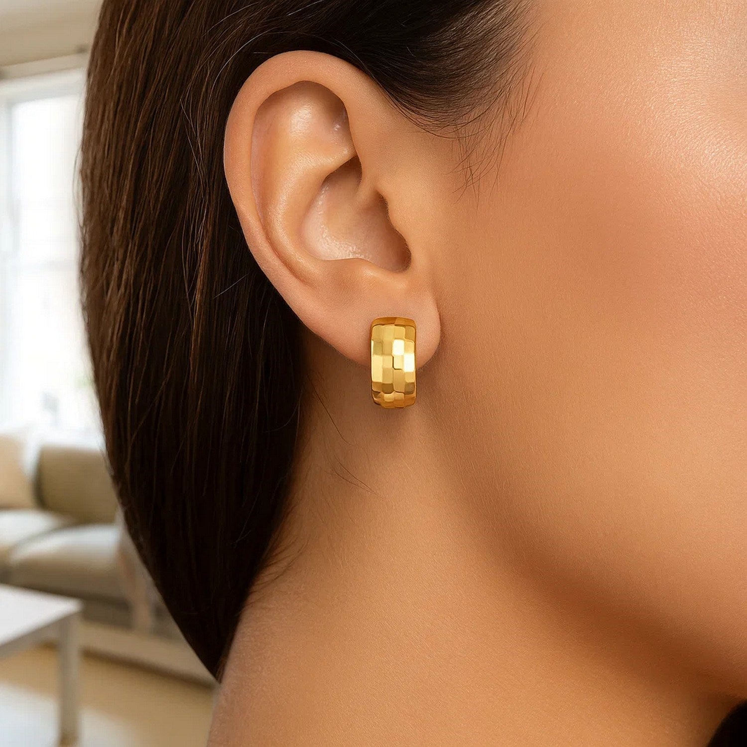 14k yellow gold hoop earrings featuring a modern checkerboard pattern, exuding elegance and contemporary style.