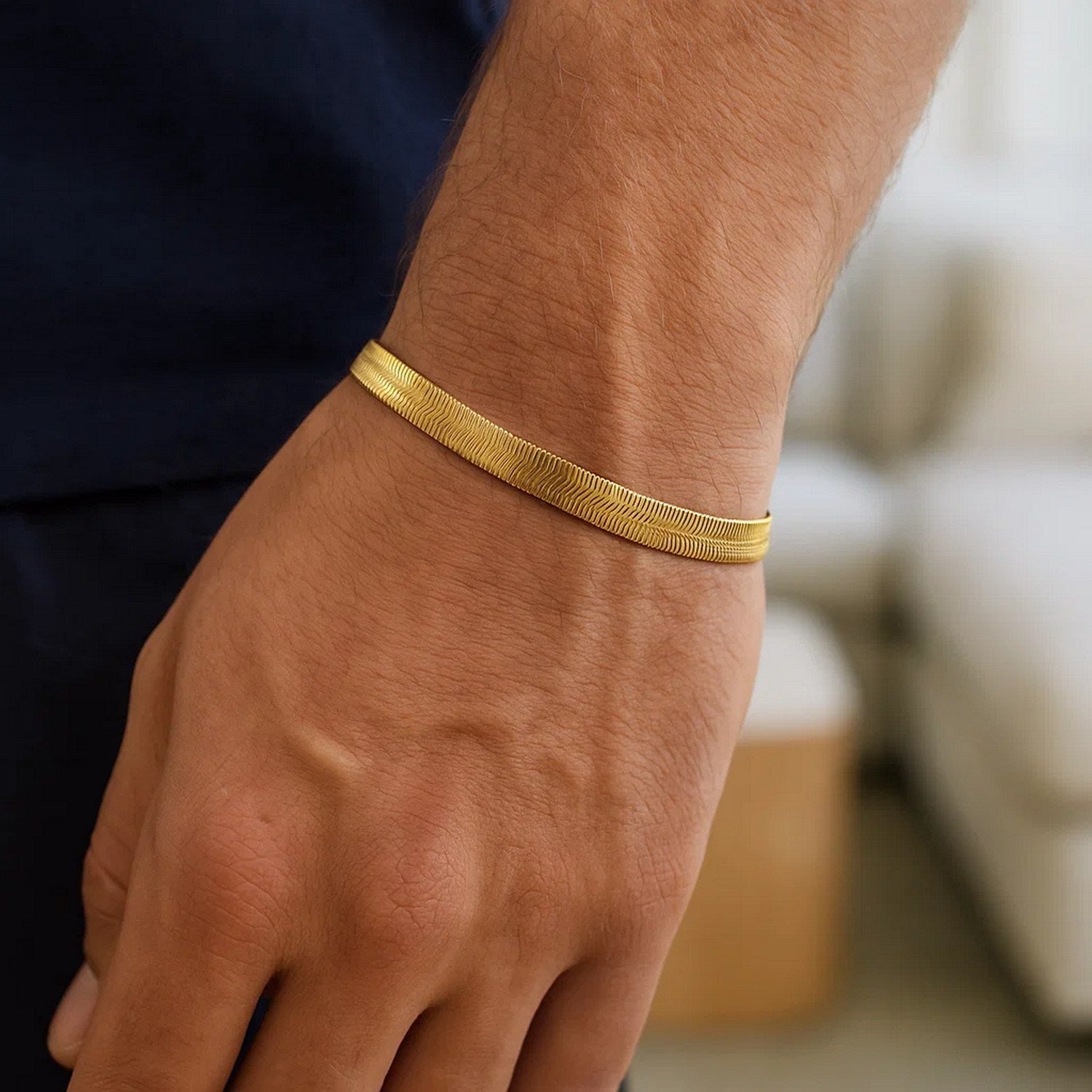 14k yellow gold super flex herringbone bracelet featuring a modern design and elegant chain detail.