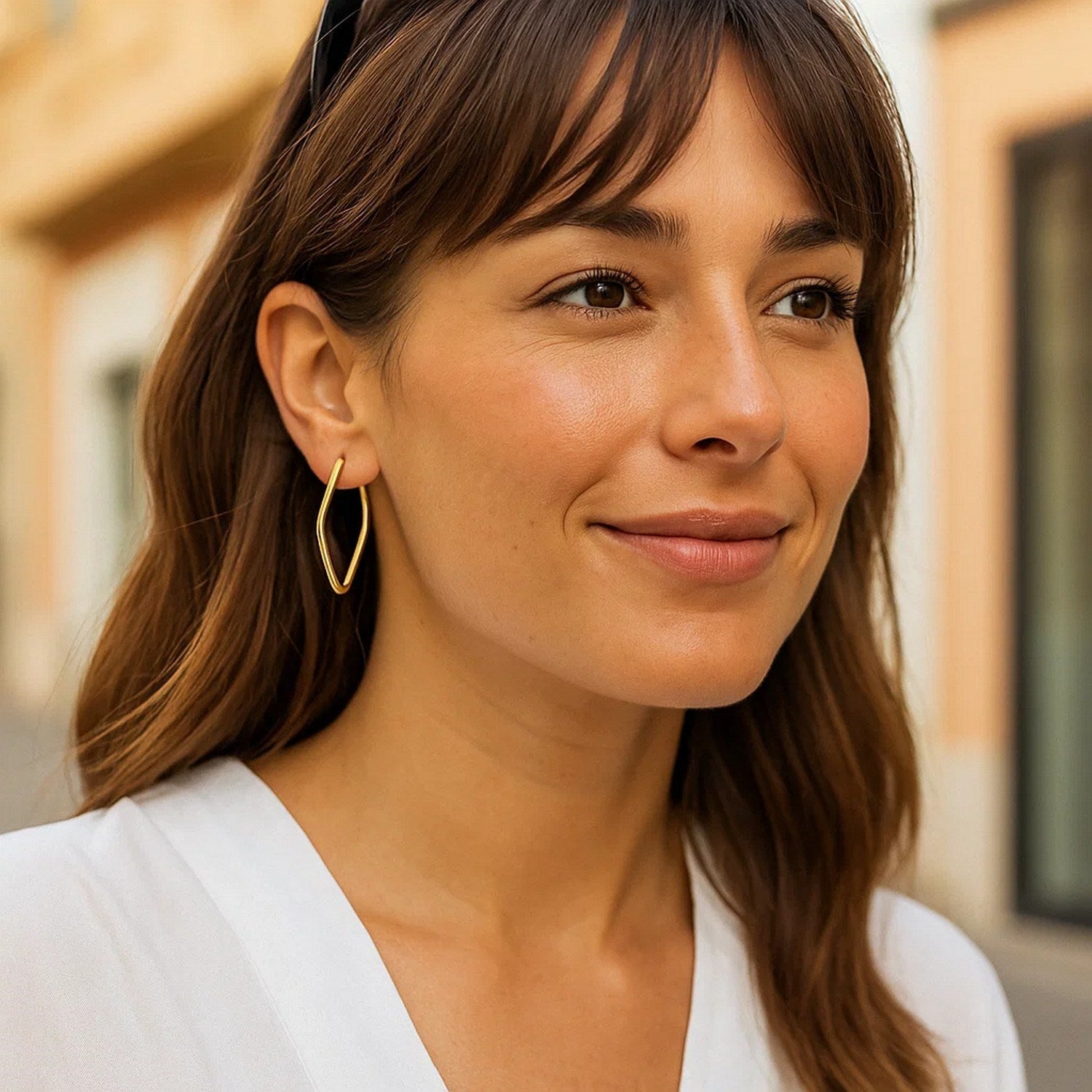 14k yellow gold modern endless marquise hoop earrings showcasing elegant design and luxurious craftsmanship