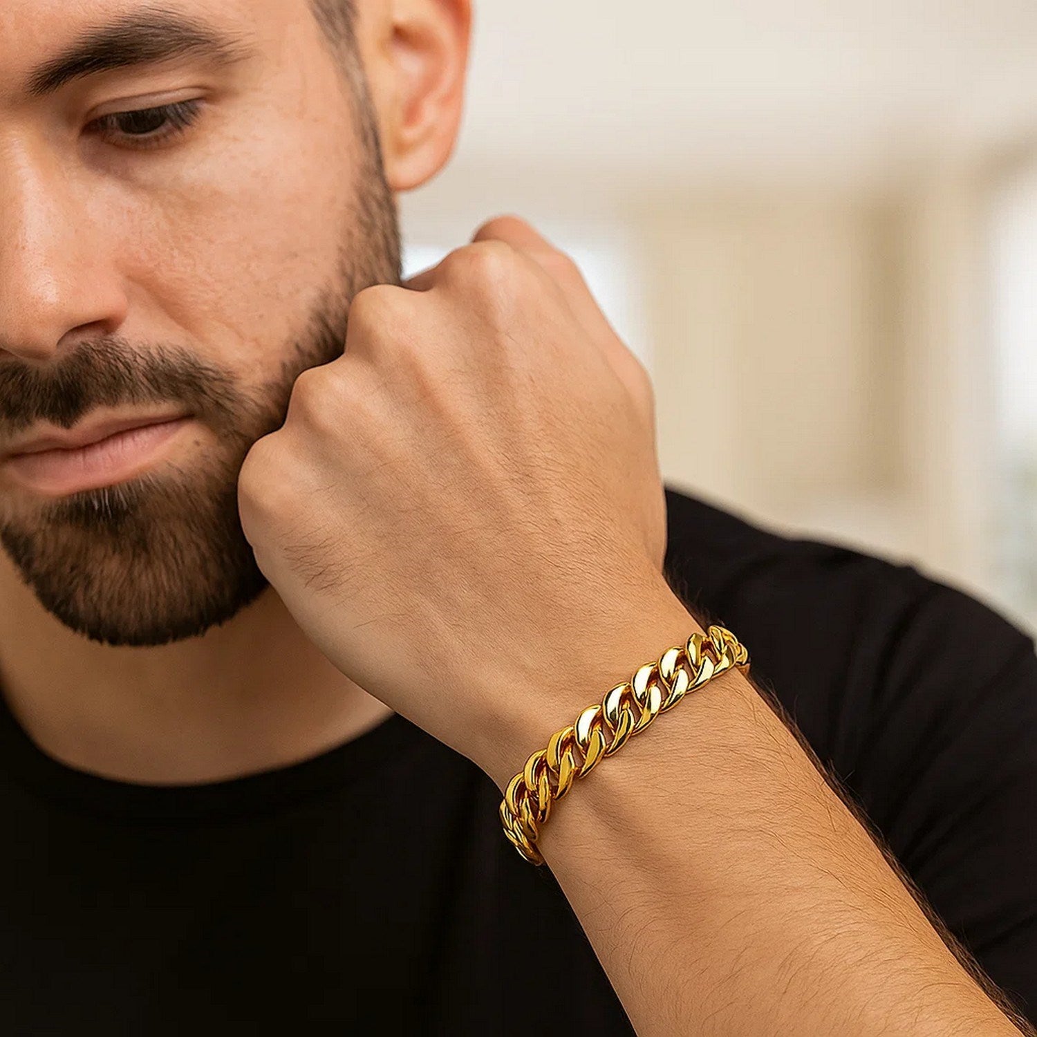 14k yellow gold Miami Cuban bracelet featuring modern round links, exuding timeless elegance and luxury.