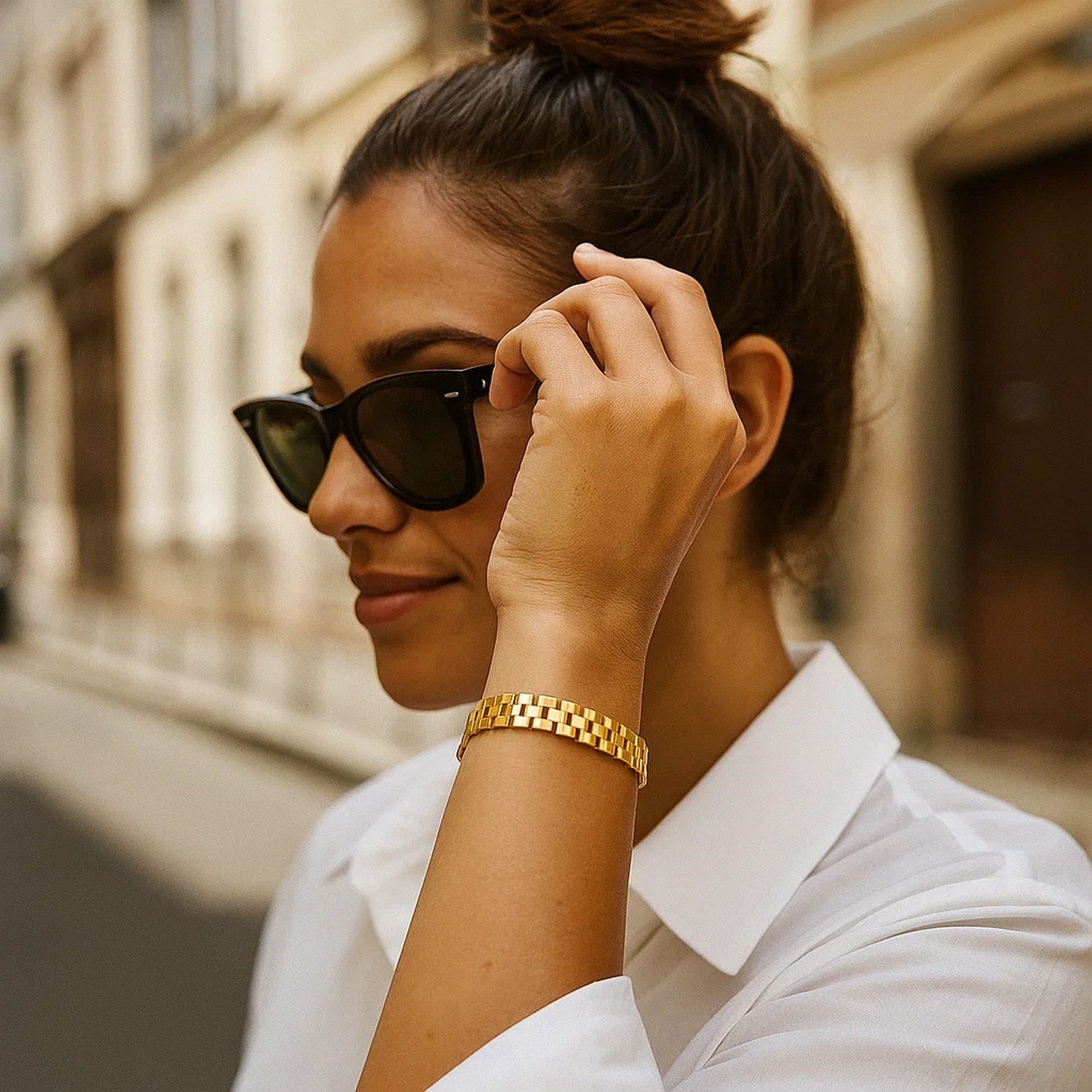 14k yellow gold small cobblestone link bracelet featuring modern design and elegant stud links.