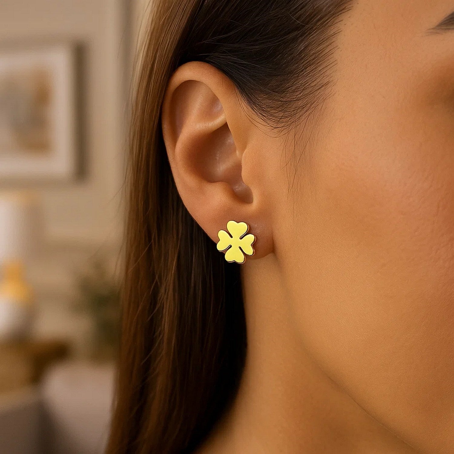 Elegant 14k yellow gold four leaf clover stud earrings, showcasing a timeless design for sophisticated style.