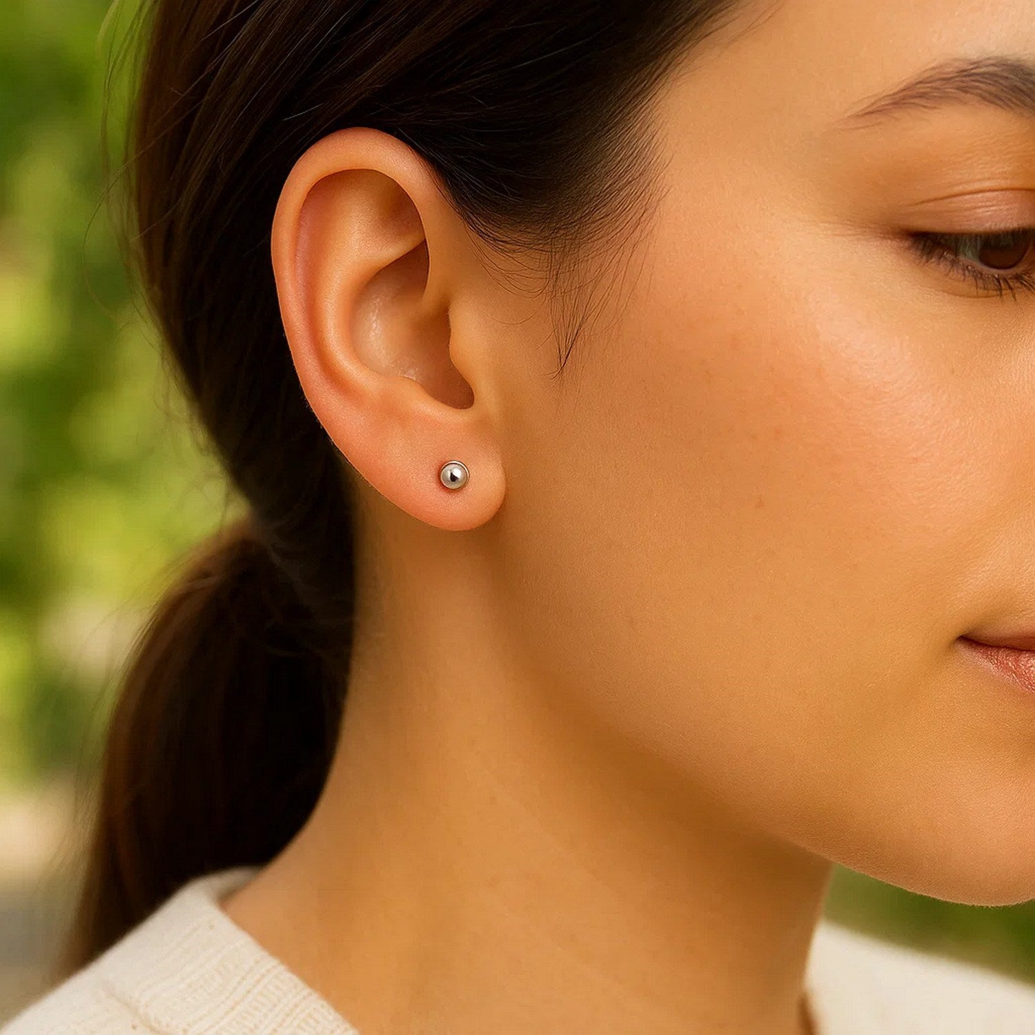 14k white gold modern spherical stud earrings, 3mm, showcasing a sleek and timeless design for elegant wear.