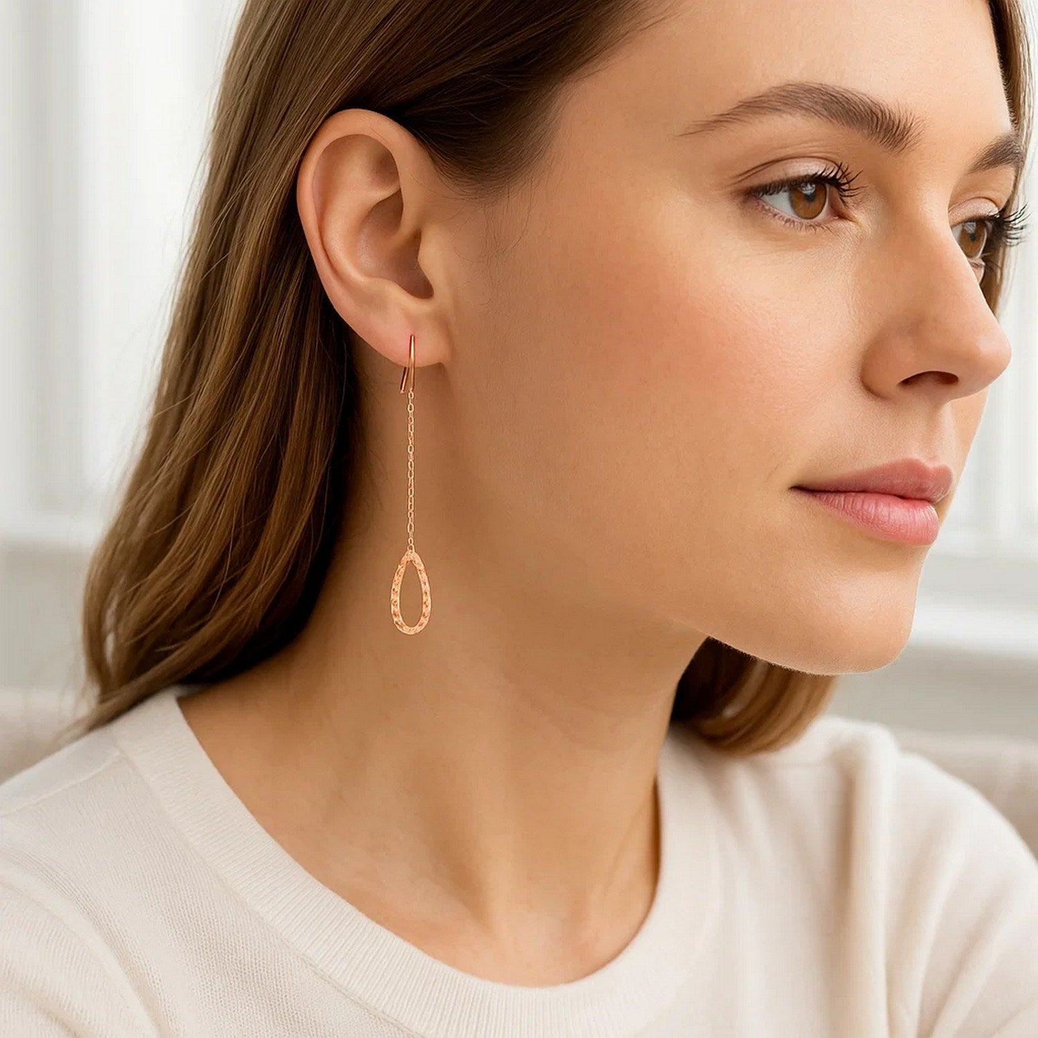 14k rose gold textured pear-shaped drop earrings with elegant chain design, perfect for sophisticated occasions.