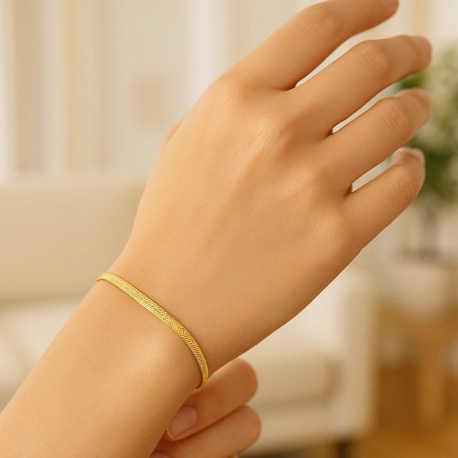 Contemporary 10k yellow gold Imperial Herringbone bracelet featuring elegant chain links and a luxurious finish.