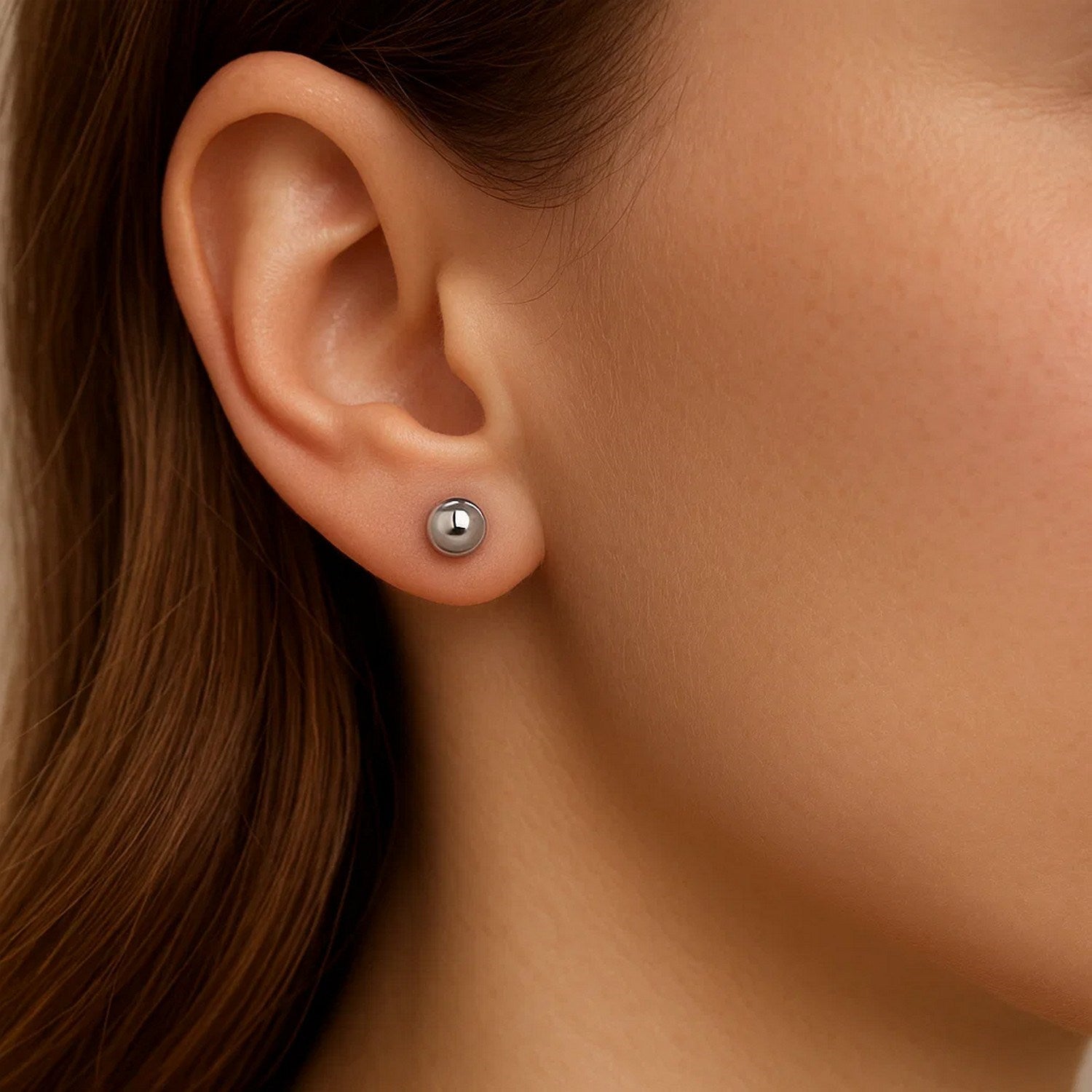 14k white gold polished round stud earrings with a contemporary design, perfect for elegant everyday wear.
