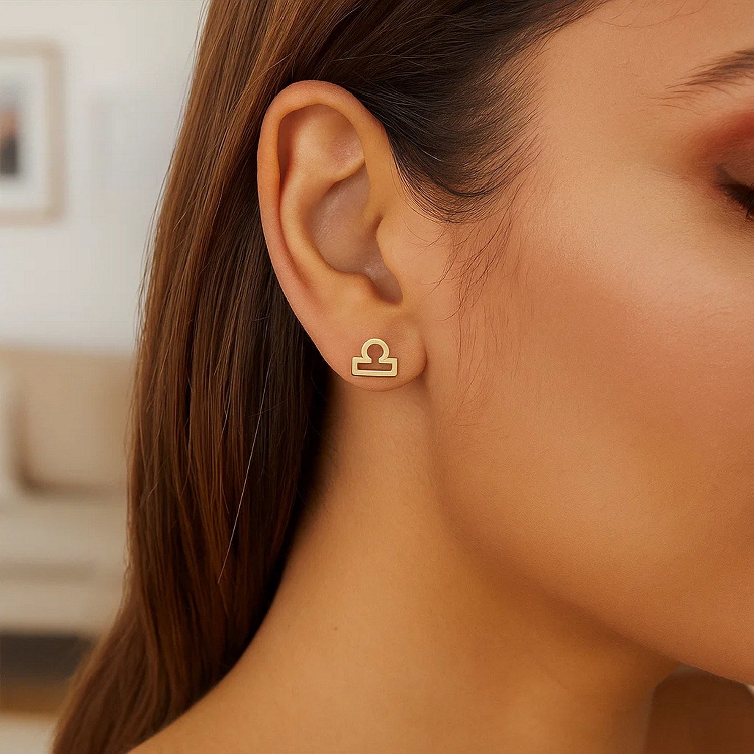 14k yellow gold modern stud earrings featuring a sleek design, perfect for elegant everyday wear.