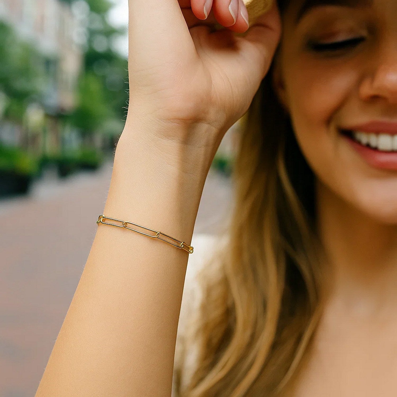 14k yellow gold wire paperclip bracelet with contemporary round links, showcasing elegance and modern design.
