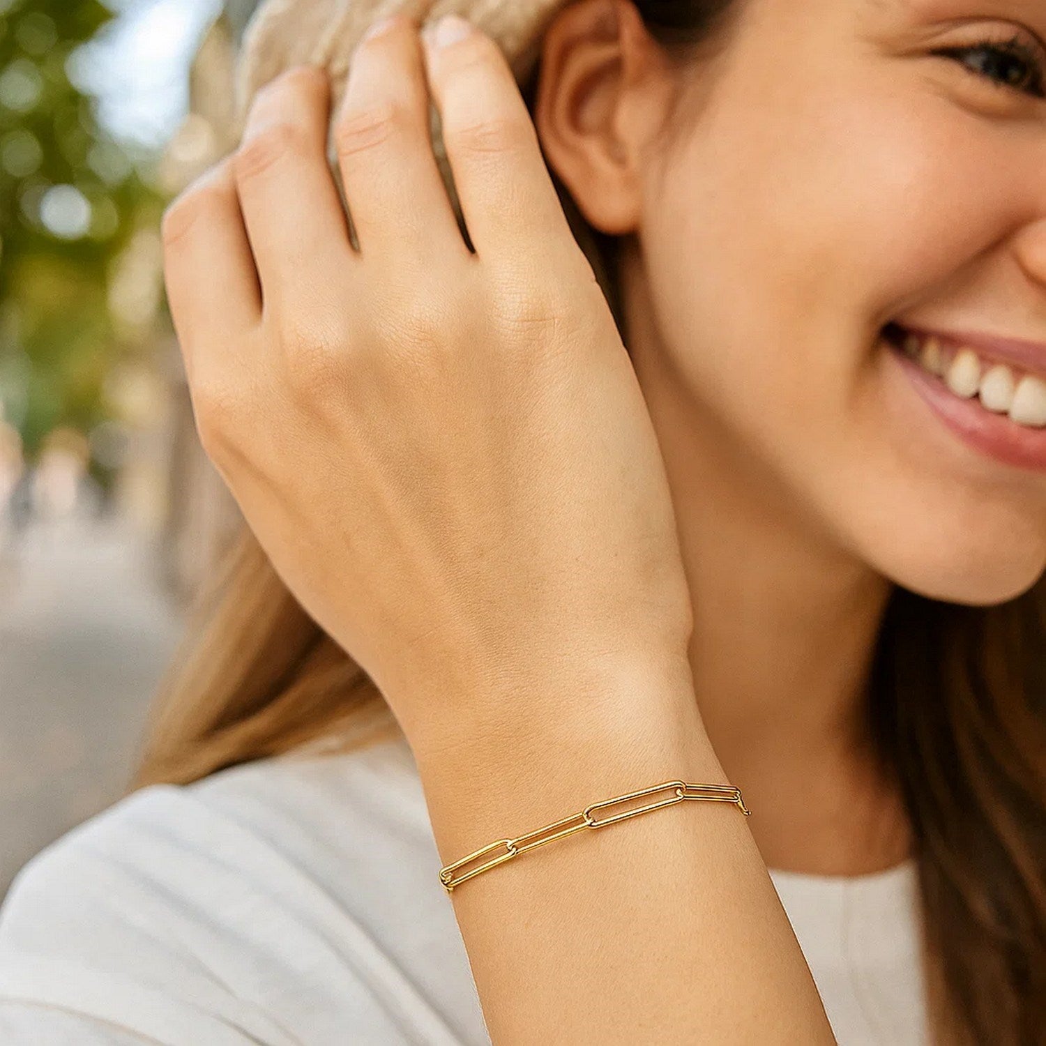 14k yellow gold wire paperclip bracelet with contemporary round links, showcasing elegance and modern design.