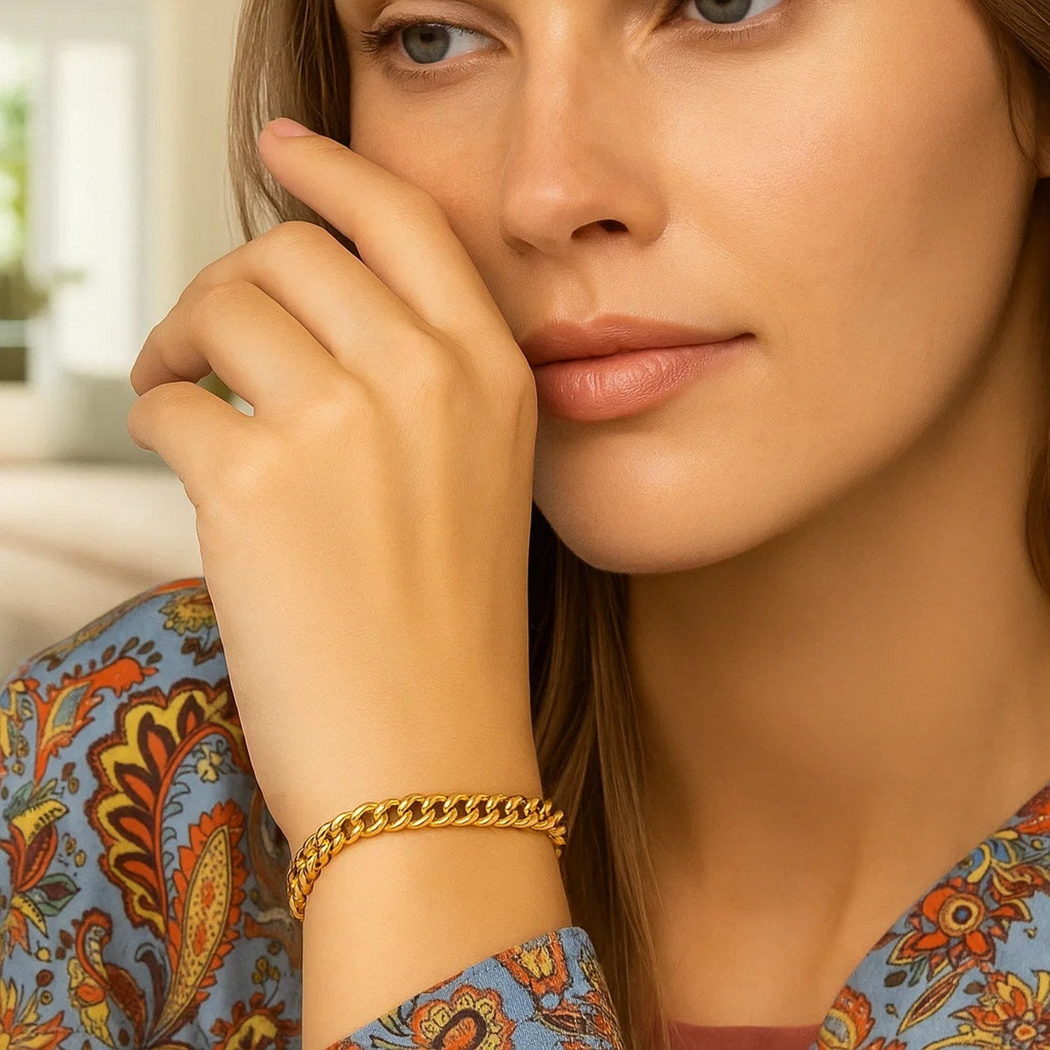 14k yellow gold petite faceted Cuban link chain bracelet, elegant design with 4.50 mm links for a luxurious touch.