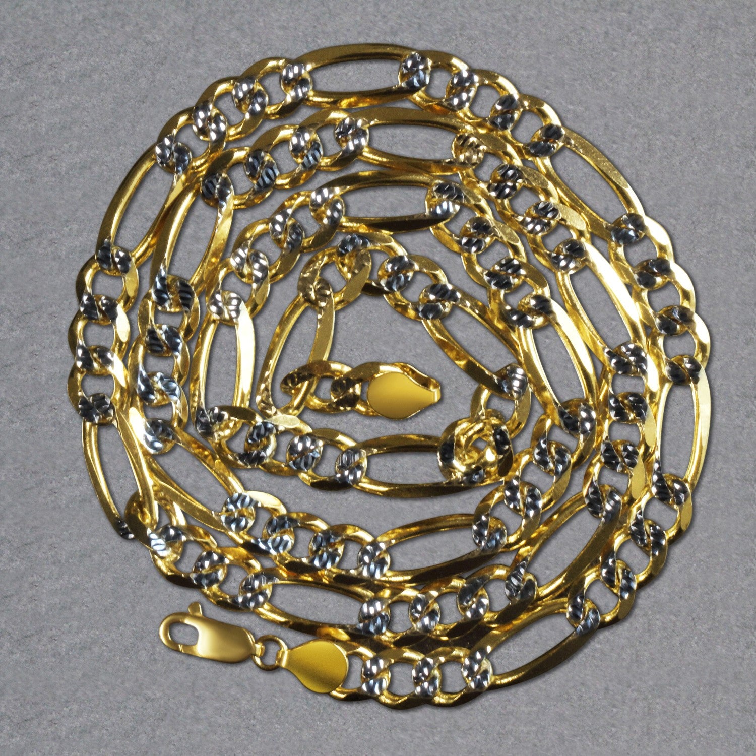 14K yellow gold solid pave Figaro chain, 7.00 mm links, showcasing contemporary elegance and luxurious craftsmanship.