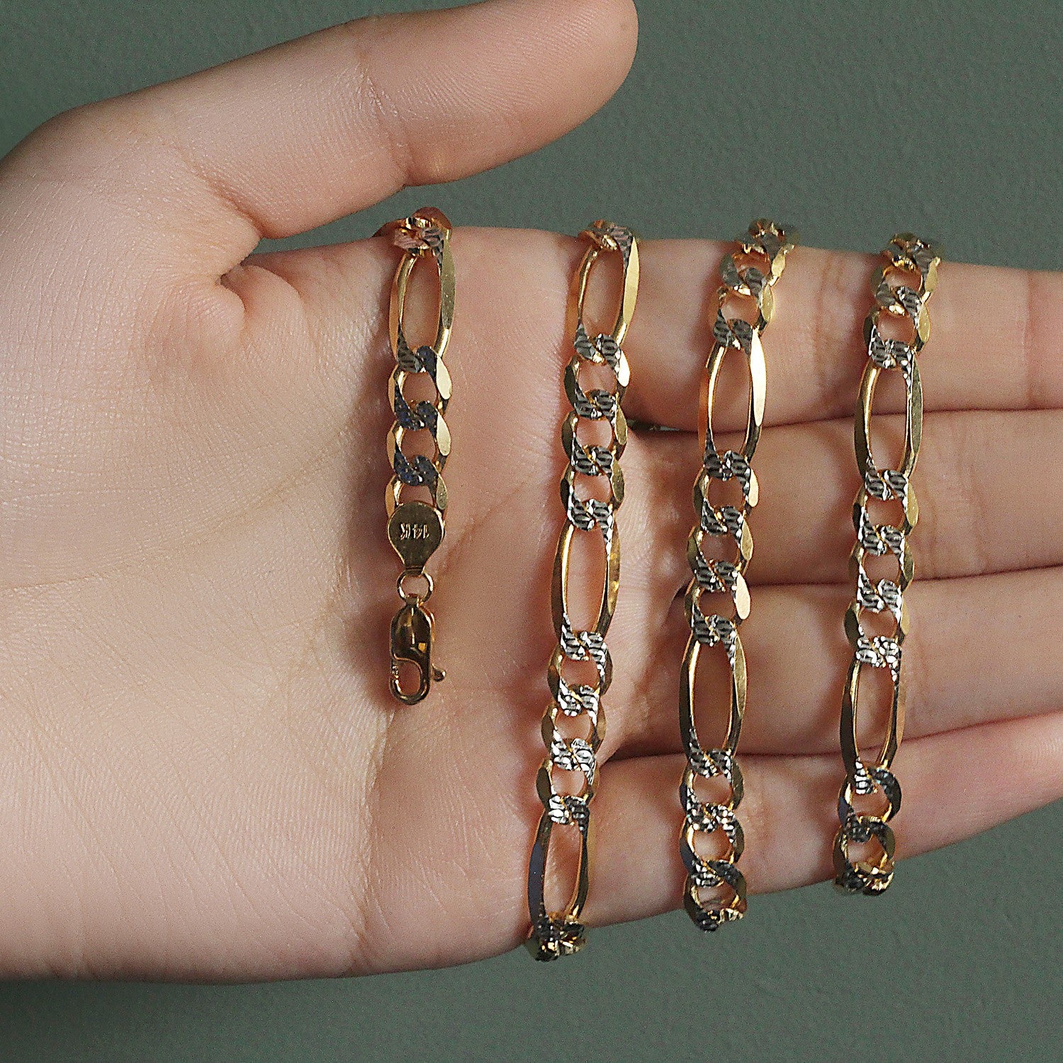 14K yellow gold solid pave Figaro chain, 7.00 mm links, showcasing contemporary elegance and luxurious craftsmanship.