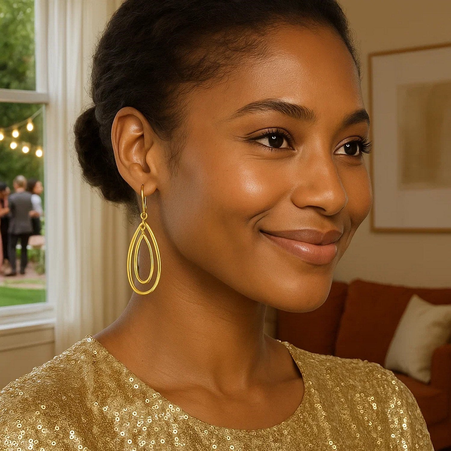 Elegant 14k yellow gold teardrop dangle earrings showcasing a refined drop design for a luxurious touch.