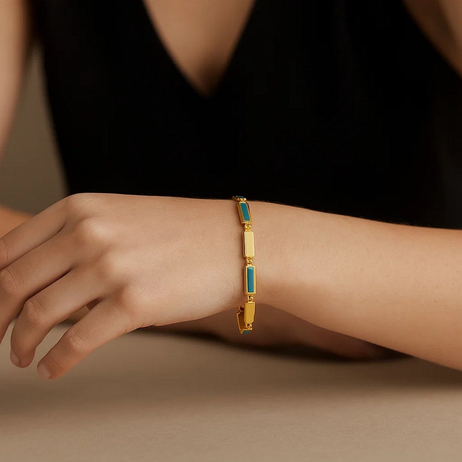 Elegant 14k yellow gold bracelet featuring turquoise rectangle links and diamond accents for a luxurious touch.