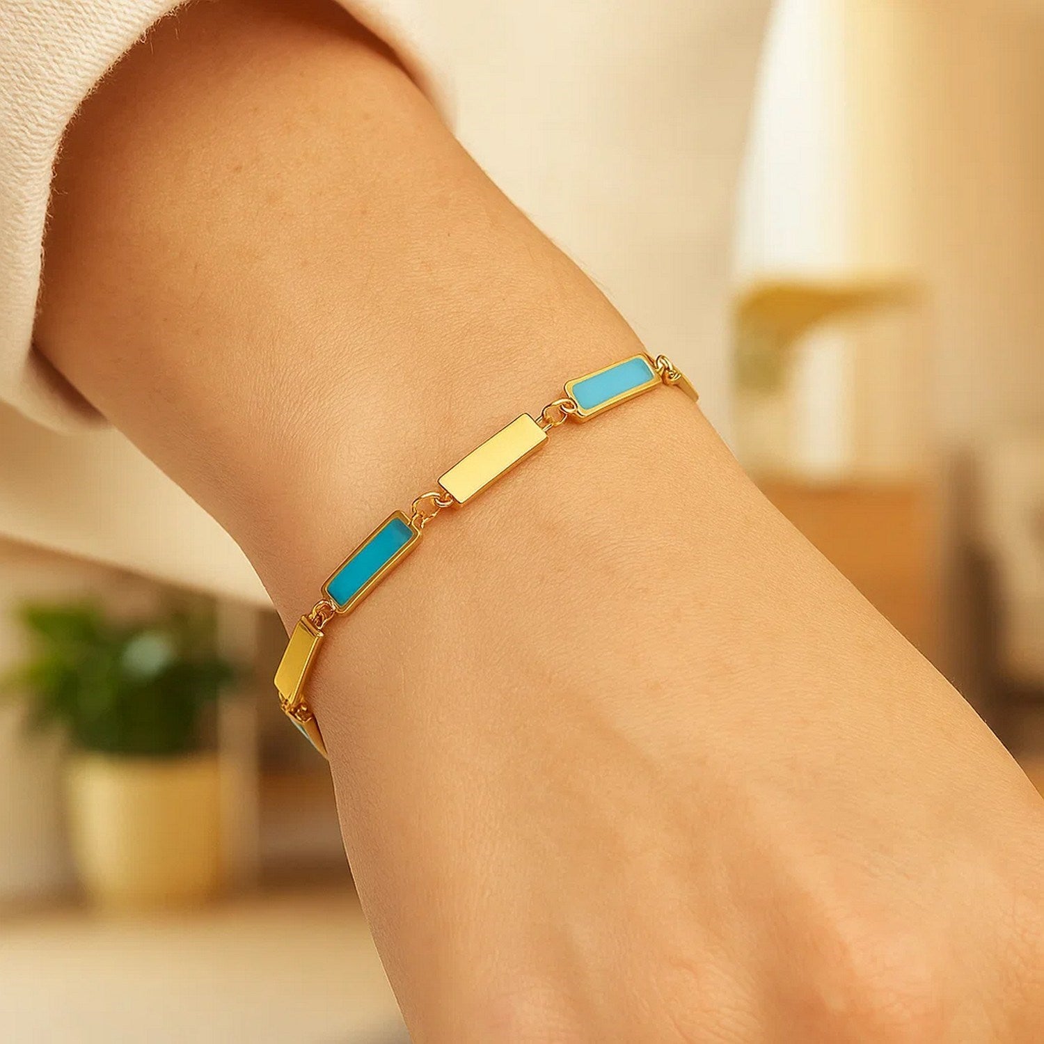 14K yellow gold bracelet featuring elegant turquoise rectangle links and diamond accents for a luxurious touch.