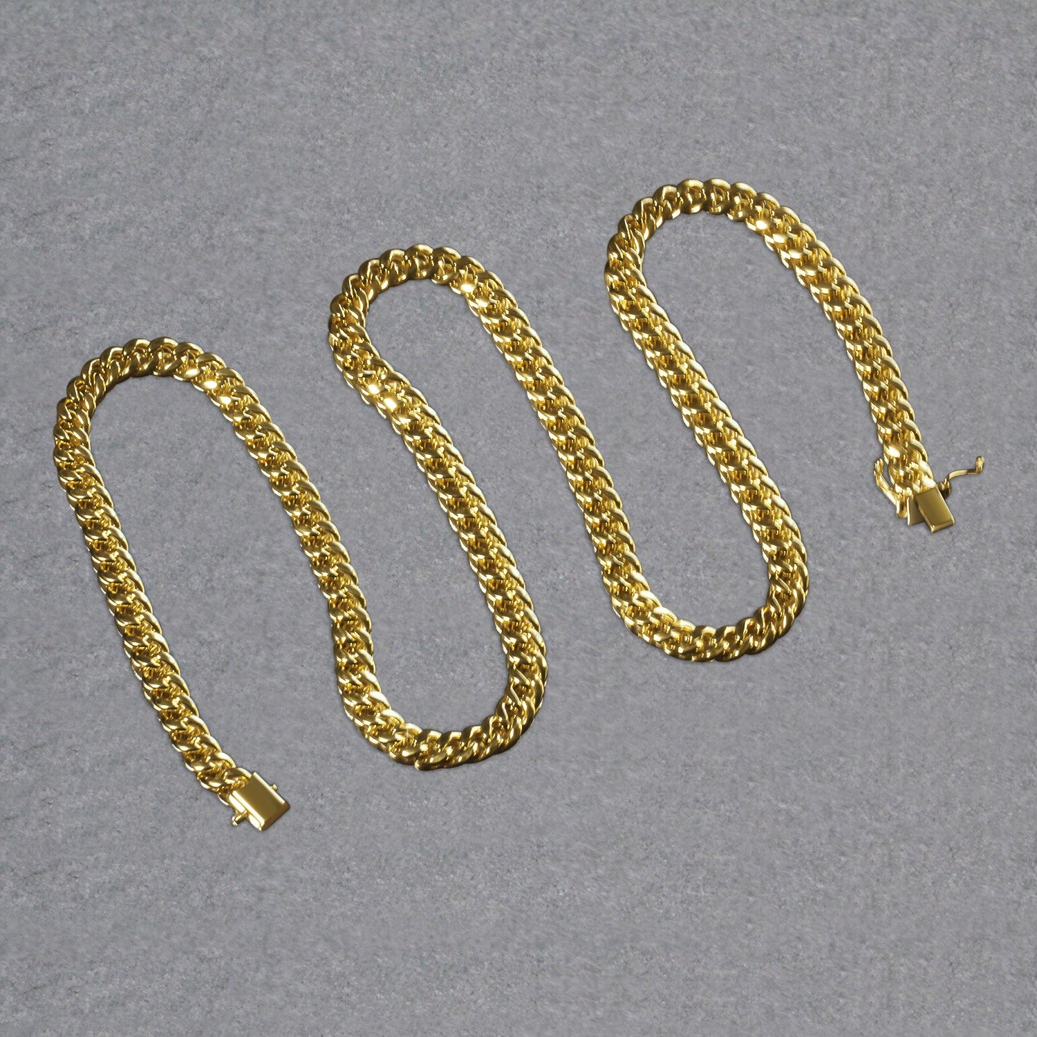 14k yellow gold semi-solid Miami Cuban chain, 6.10 mm, featuring an elegant round design for a luxurious look.
