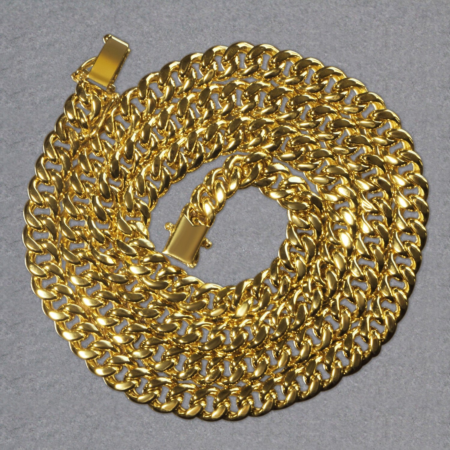 14k yellow gold semi-solid Miami Cuban chain, 6.10 mm, featuring an elegant round design for a luxurious look.