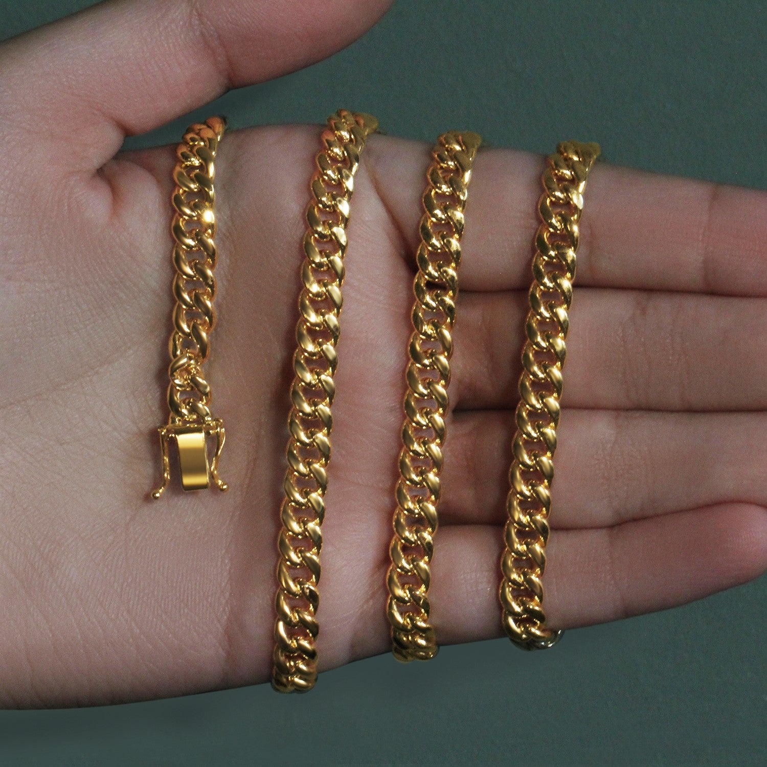 14k yellow gold semi-solid Miami Cuban chain, elegantly designed with round links, 6.10 mm width for a luxurious look.