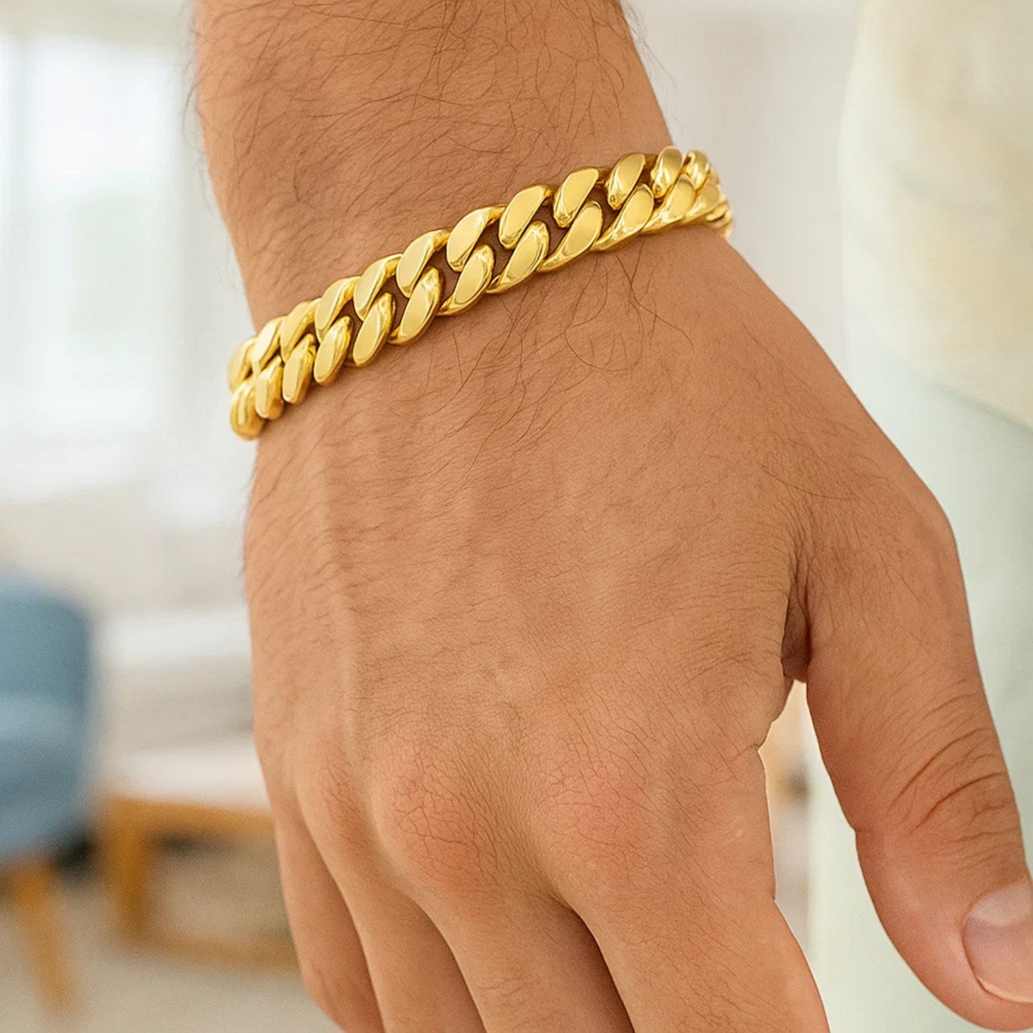 14k yellow gold semi-solid Miami Cuban bracelet with modern link design, showcasing luxurious craftsmanship and style.