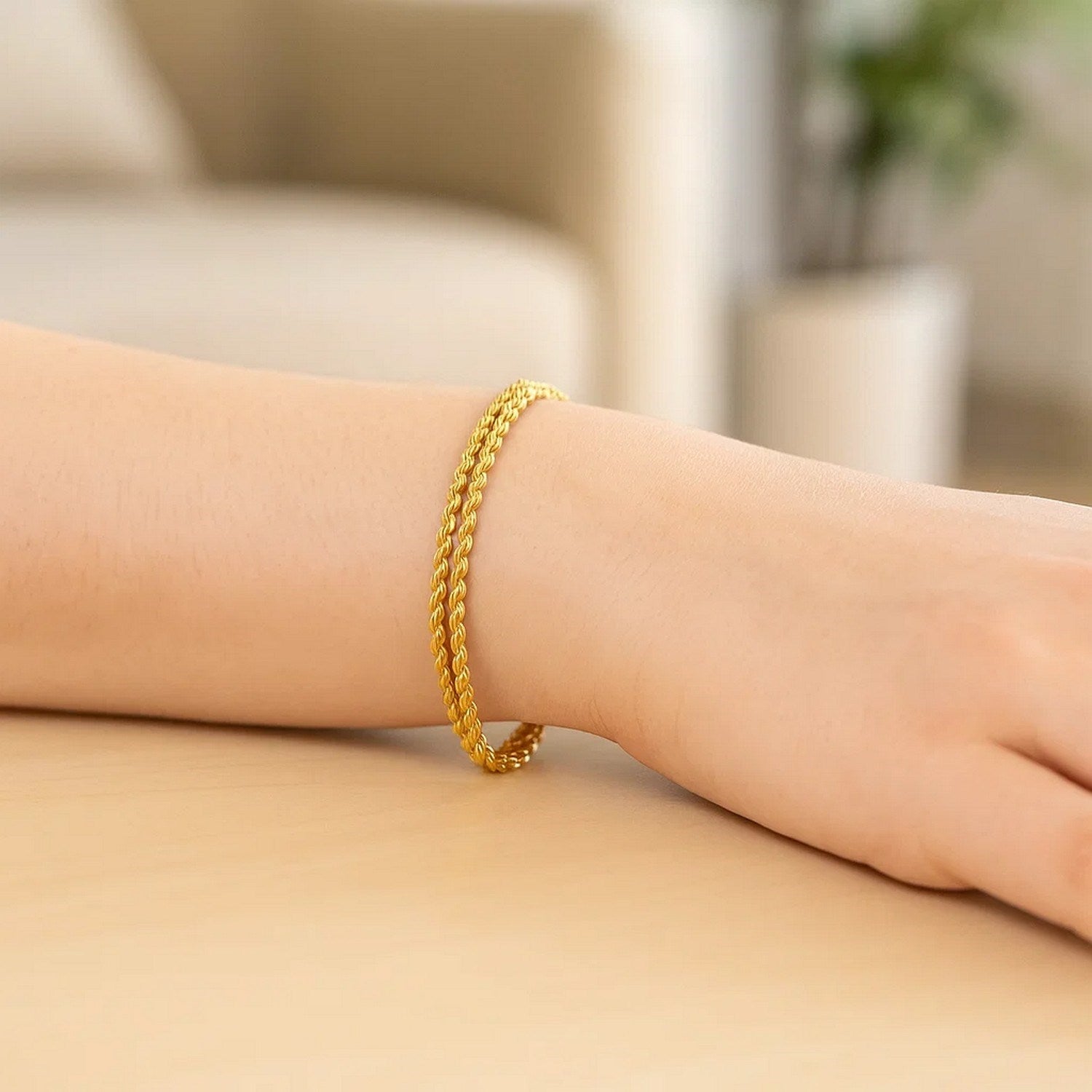 Classic double rope chain bracelet in 10k yellow gold, featuring elegant links and a timeless design.